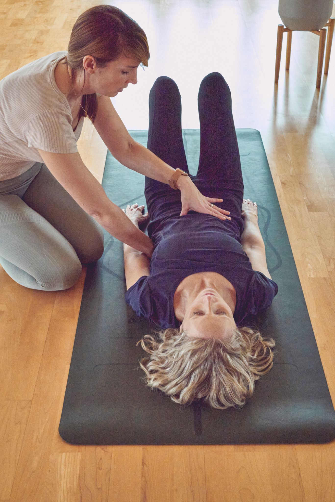 Woman practising 1:1 Pilates during natural brand photoshoot at Vida Haus Woodbridge