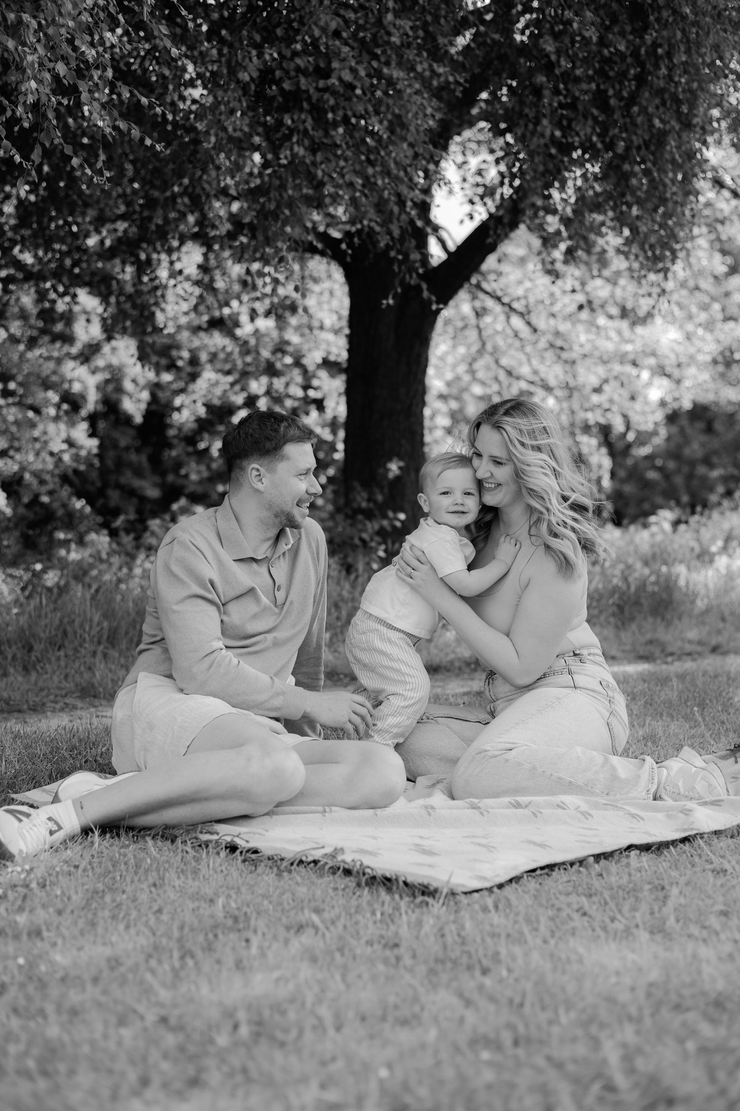 A family sat having a picnic