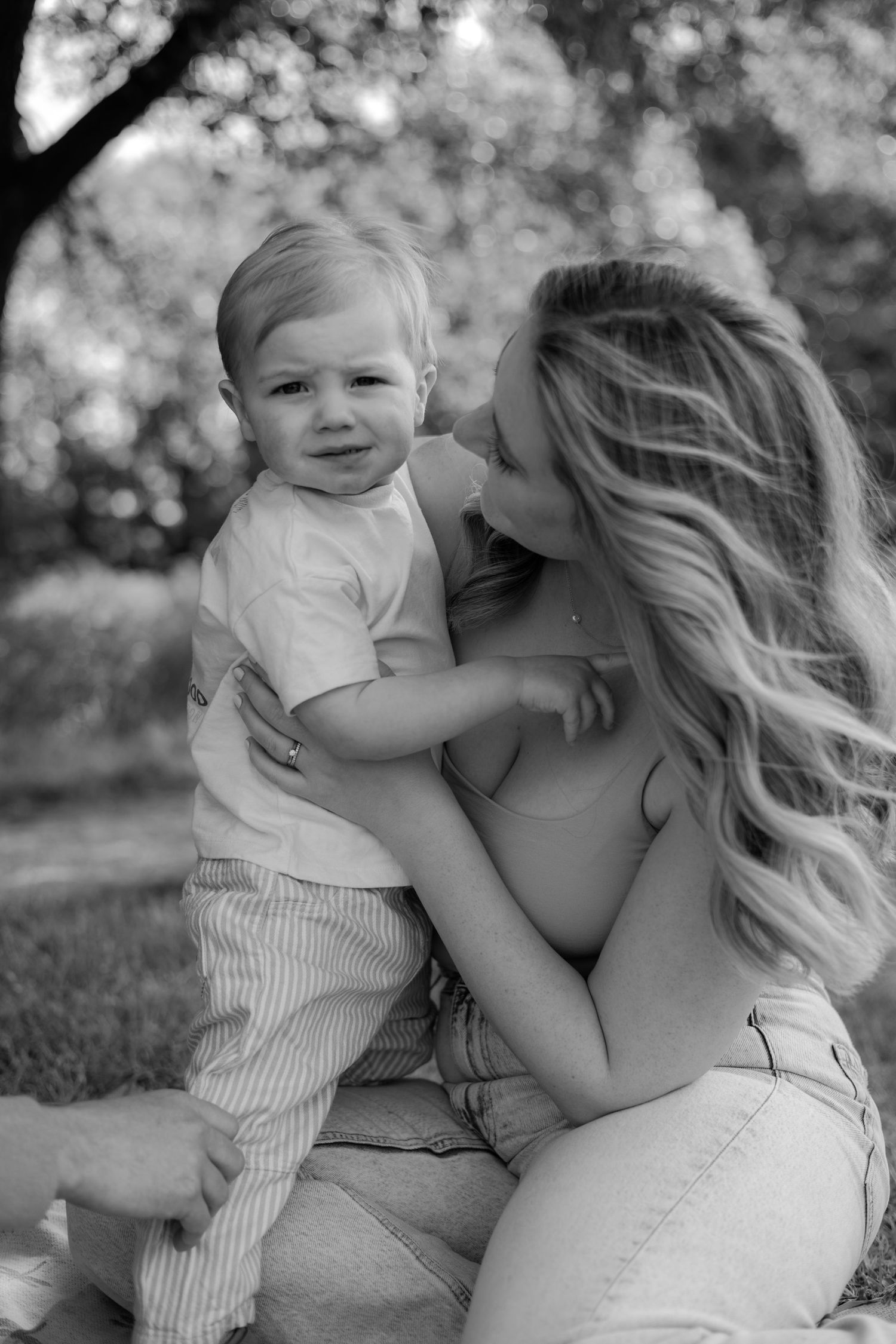 A mother and son embracing eachother