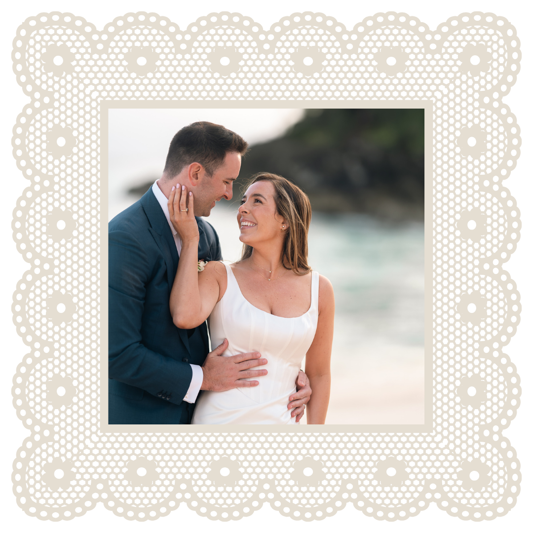 Romantic couple at beach in white lace-bordered square photo frame with pearl details.