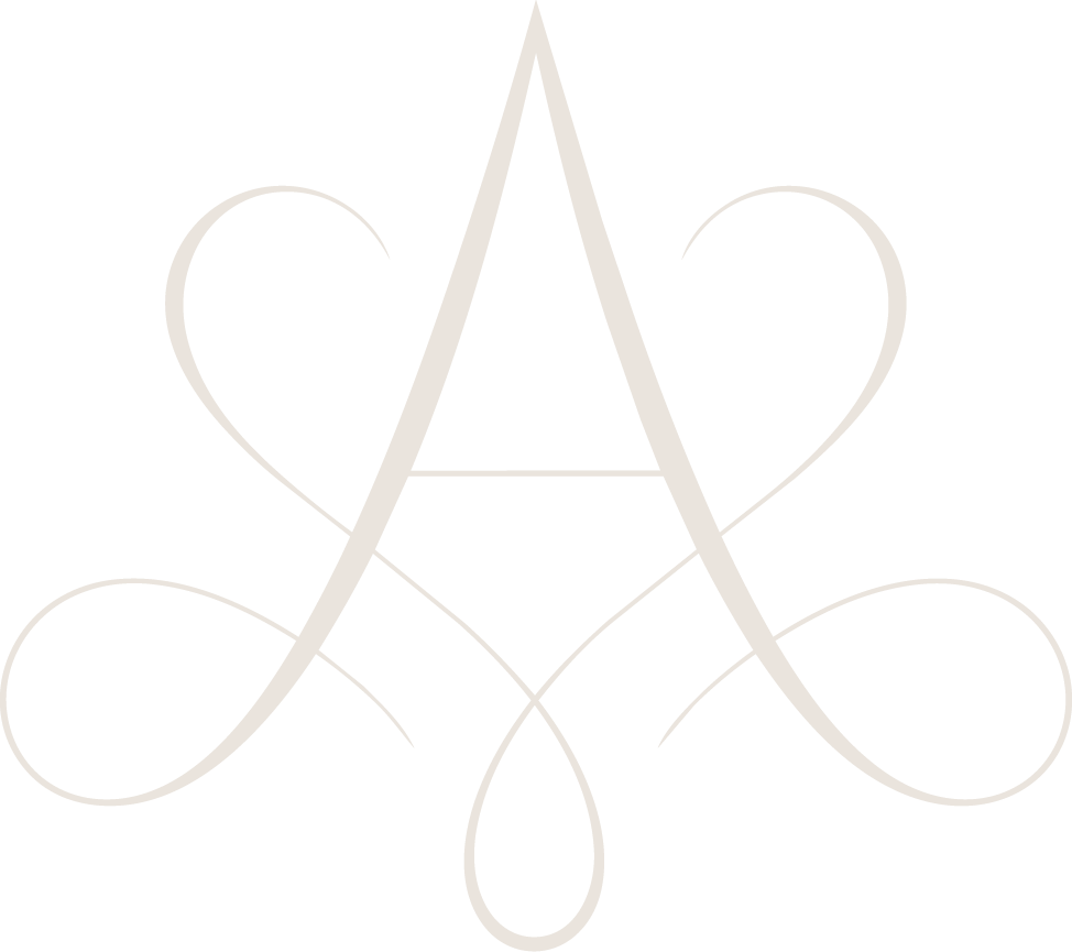 Elegant decorative letter A with ornate swirling calligraphy flourishes in soft beige tones.