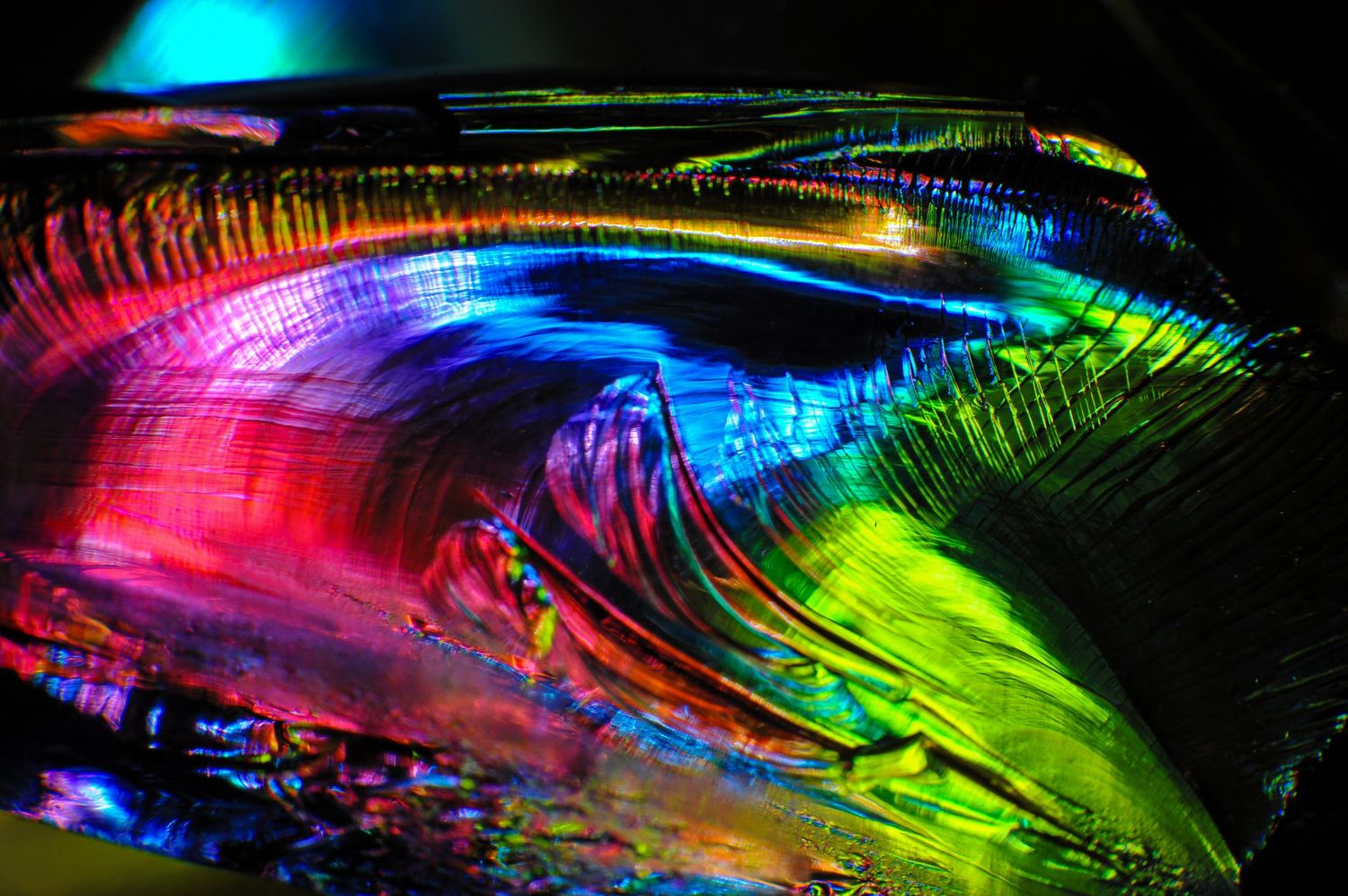 Macro Abstract. Light shining through broken glass