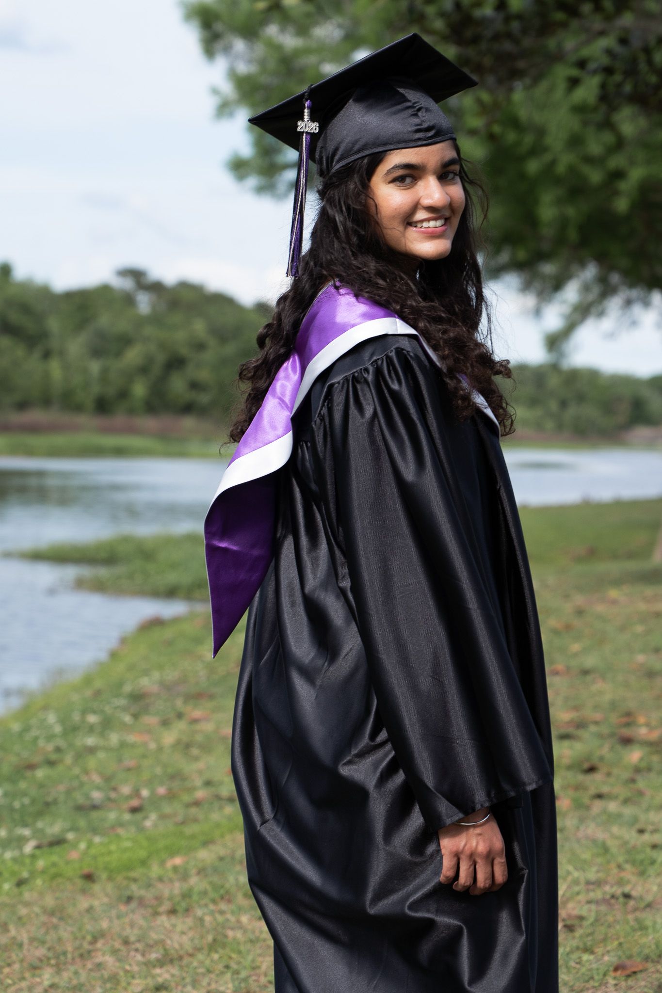 Senior session portrait lakeside in Central Florida, Orlando. High school graduate.