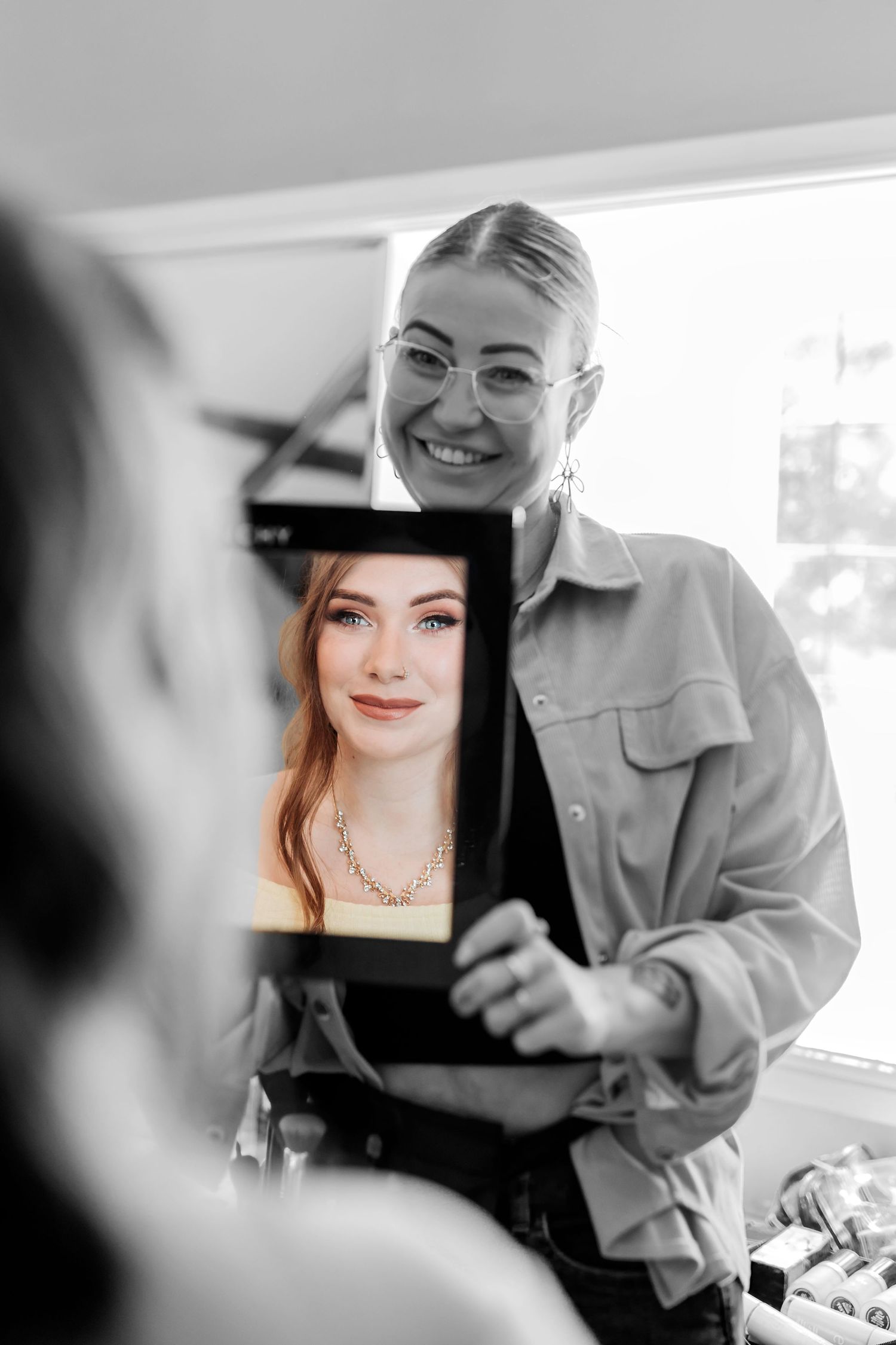 Black and white artistic portraits displayed in sequence showing different camera angles and expressions.