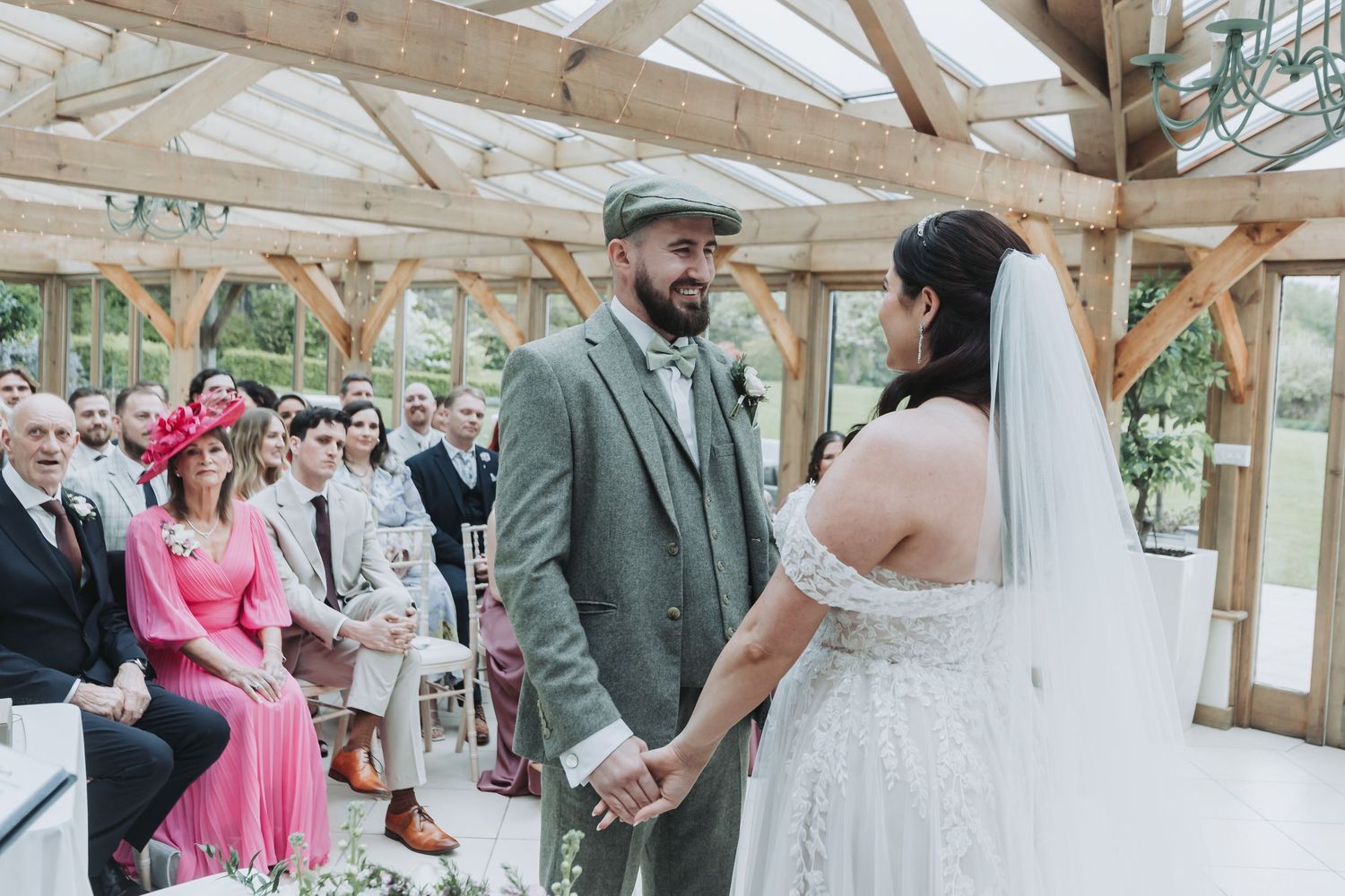 Series of wedding photos showing celebration moments in a rustic wooden beam venue with natural lighting.
