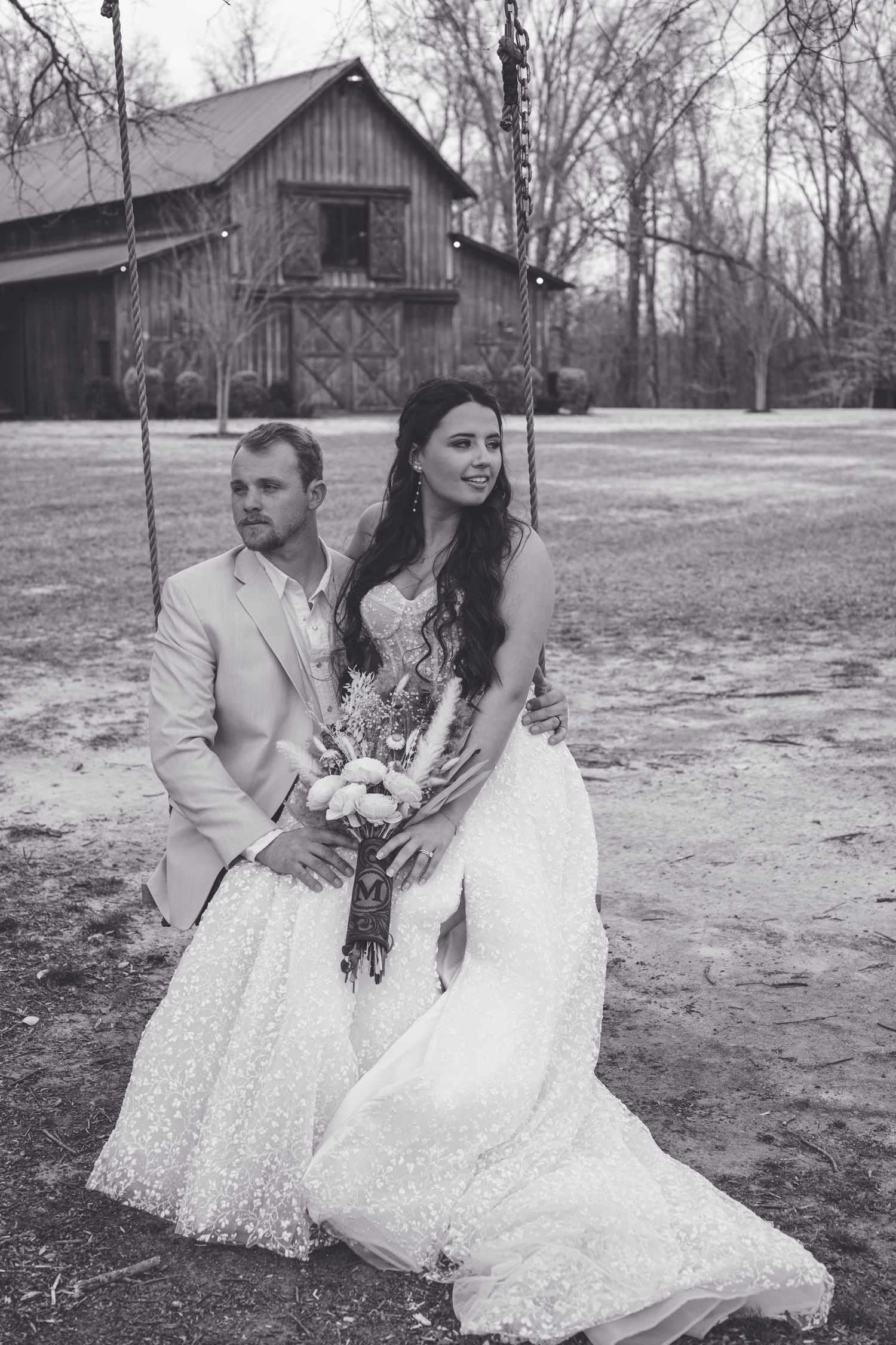 Wedding couple portraits at Hidden Acres Wedding Event in Gillsville, GA. Stunning Barn wedding venue with tree swing.