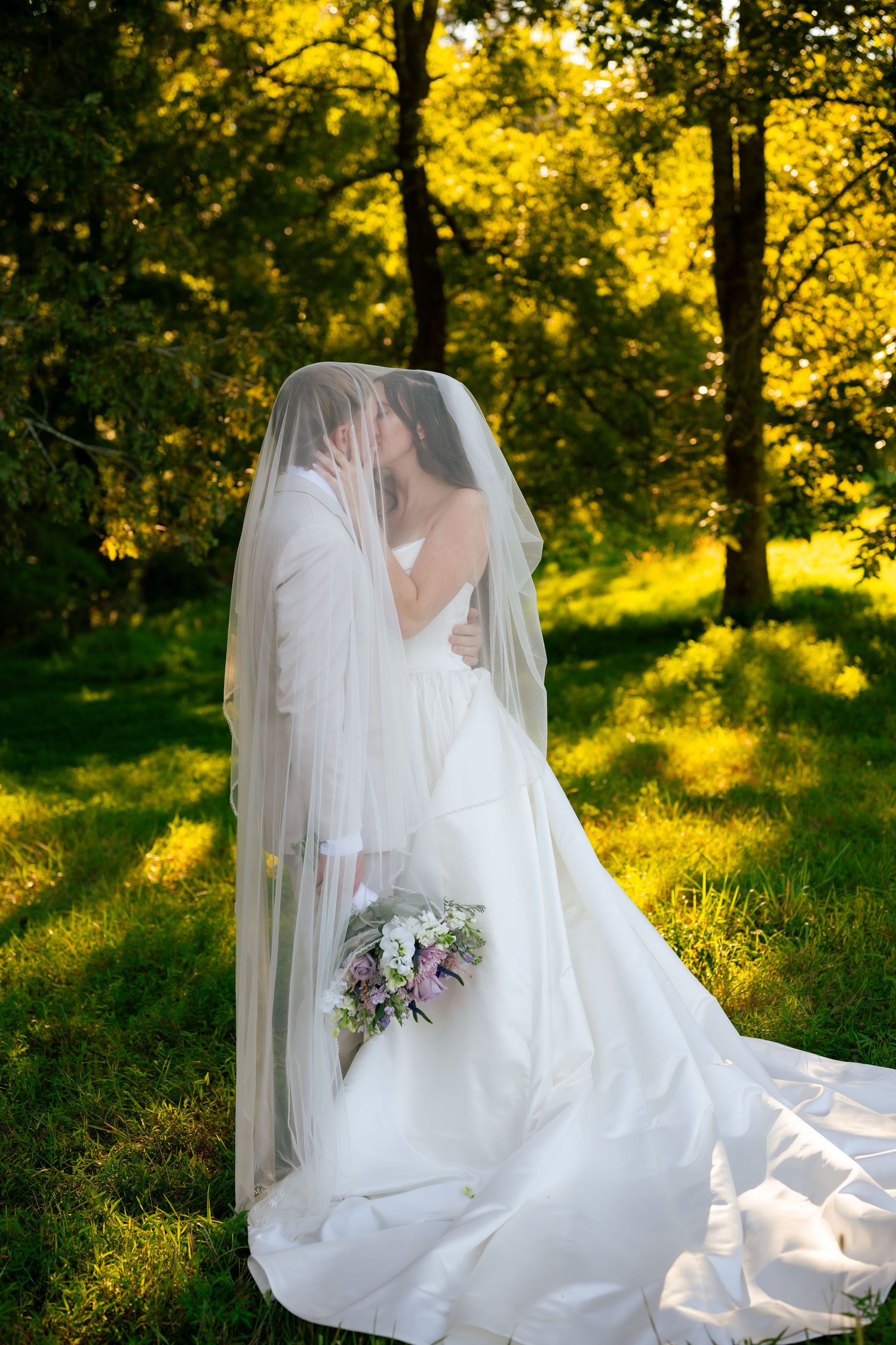 Bride and groom under veil wedding photo at Summit Farms, GA shot by HeavenlyImagery