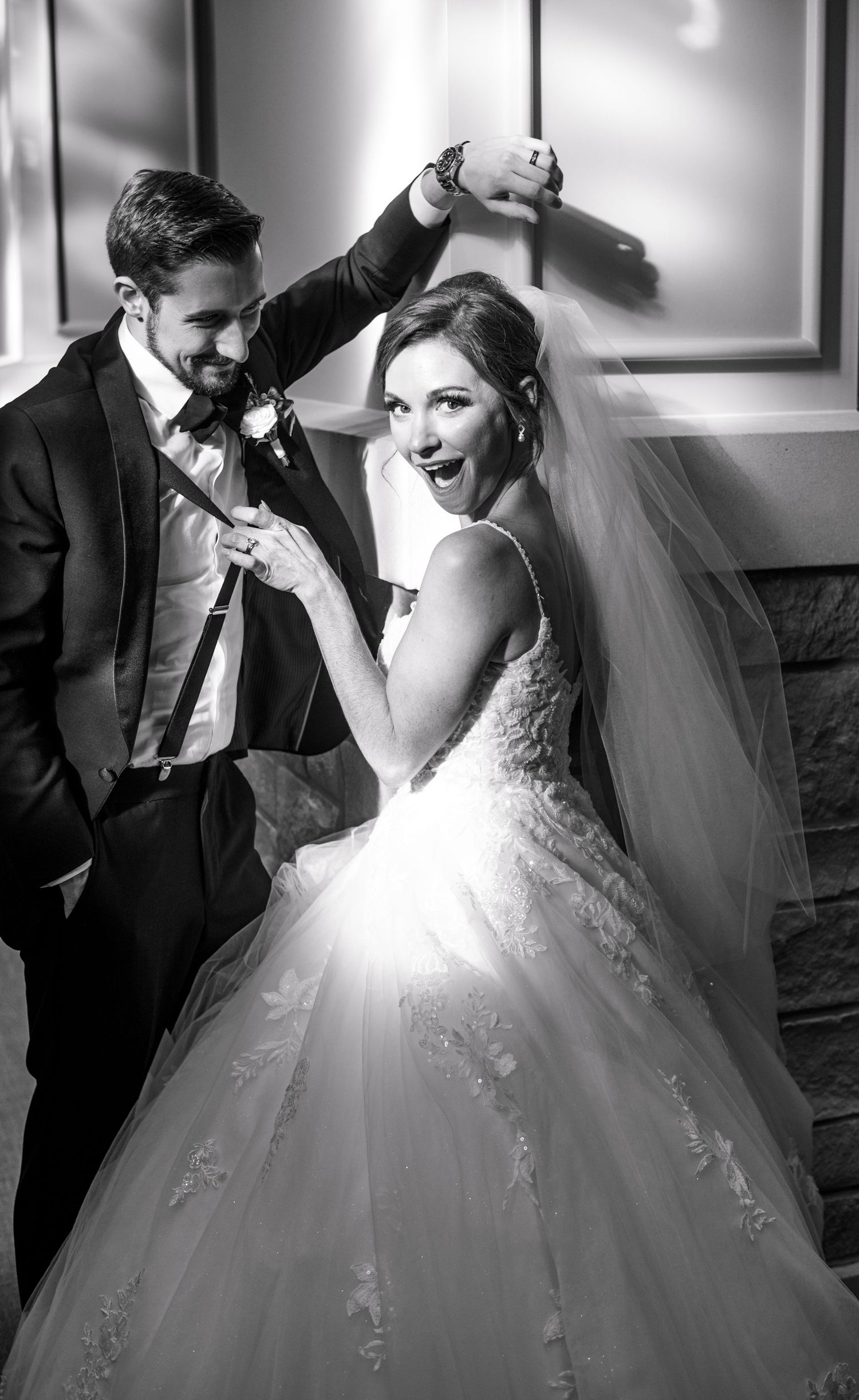 A black and white photo of a couple dancing together at their wedding celebration. North Carolina