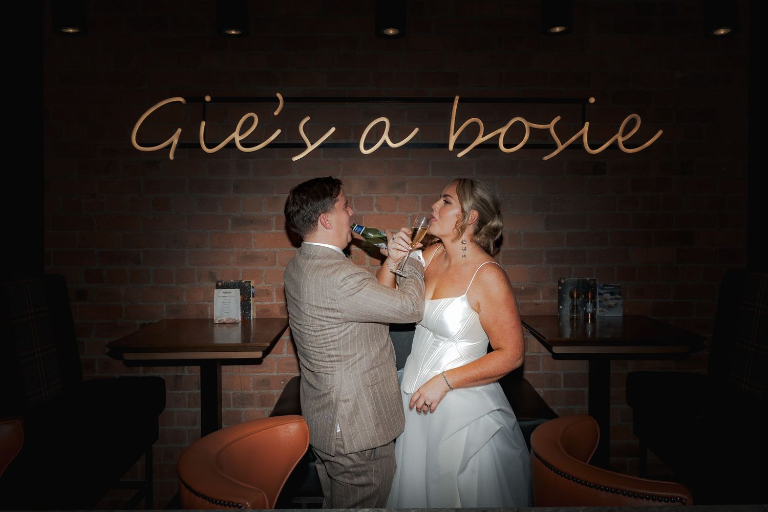 A couple shares a romantic dance together during their wedding reception at the Sandman Signature, Aberdeen.