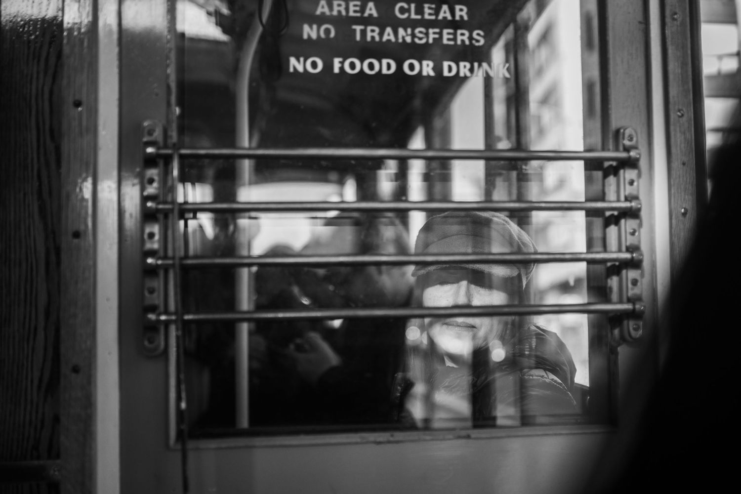 Five sequential frames of a New York City subway platform with NO FOOD OR DRINK and AREA CLEAR signs visible.