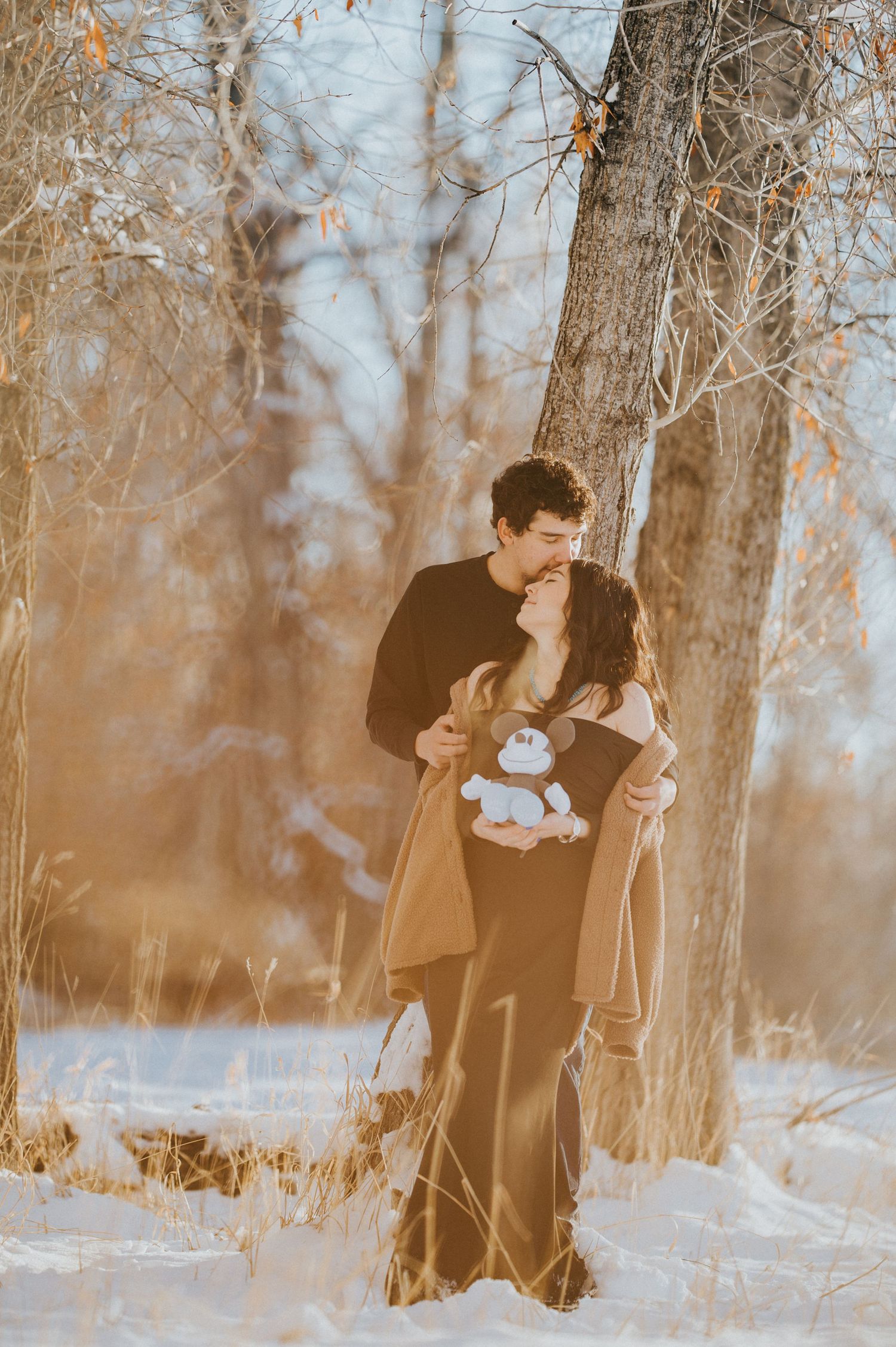 Rustic maternity portrait in a golden field near Chama, New Mexico — soft, film-inspired editing by Quiet Light by The Amoras, serving Sant