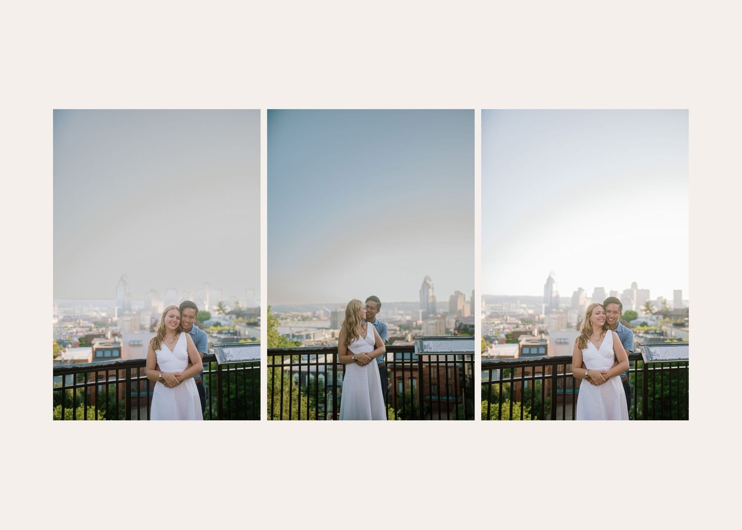 A couple stands on a city rooftop terrace against a golden sunset and cityscape backdrop.