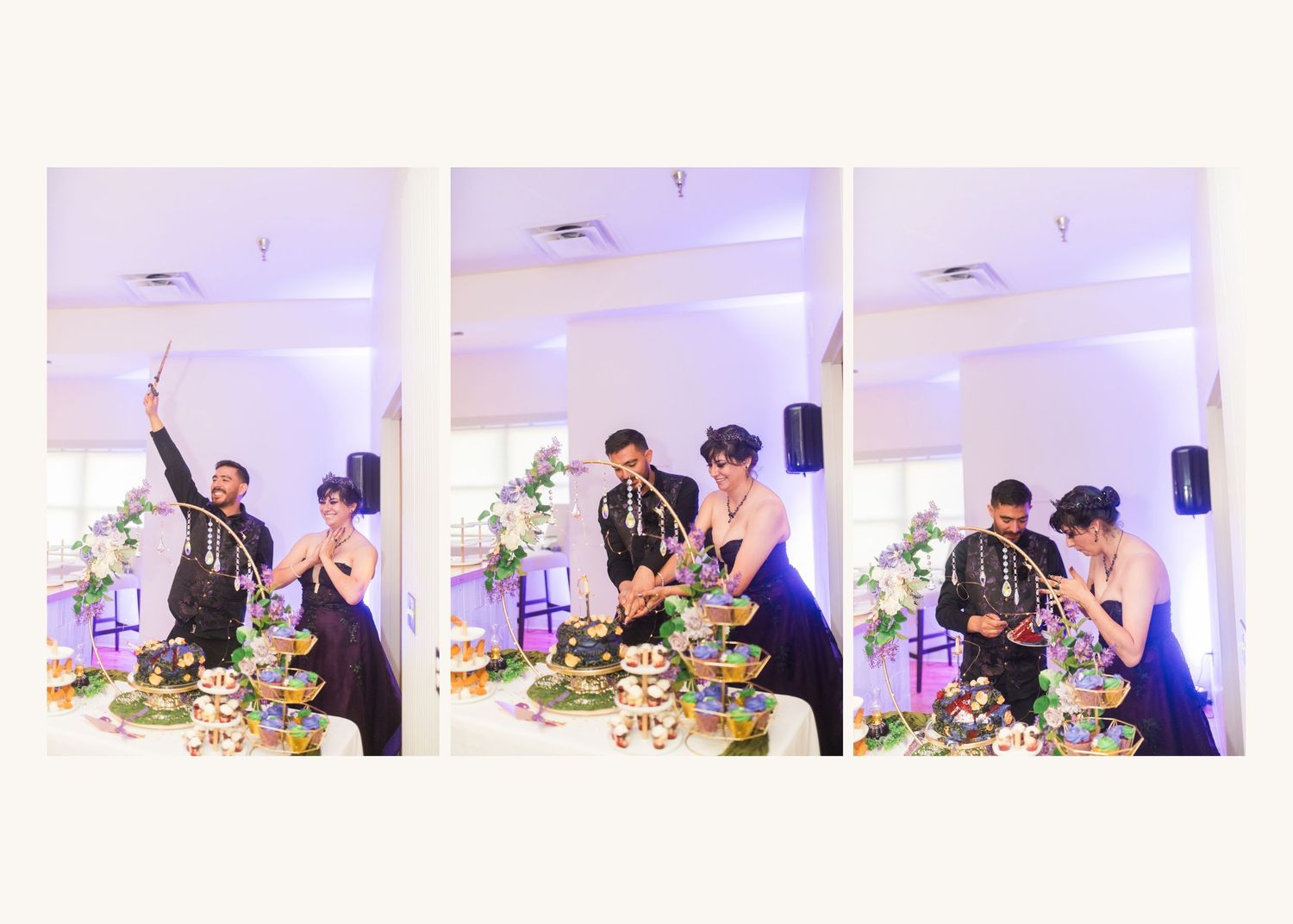 A couple cuts their wedding cake together at an elegant reception venue with floral decorations and guests nearby.