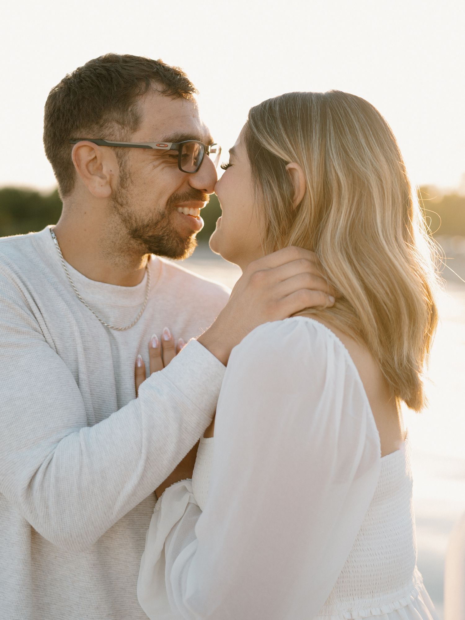 Authentic fun couples photography, engagement session at the Oshawa waterfront