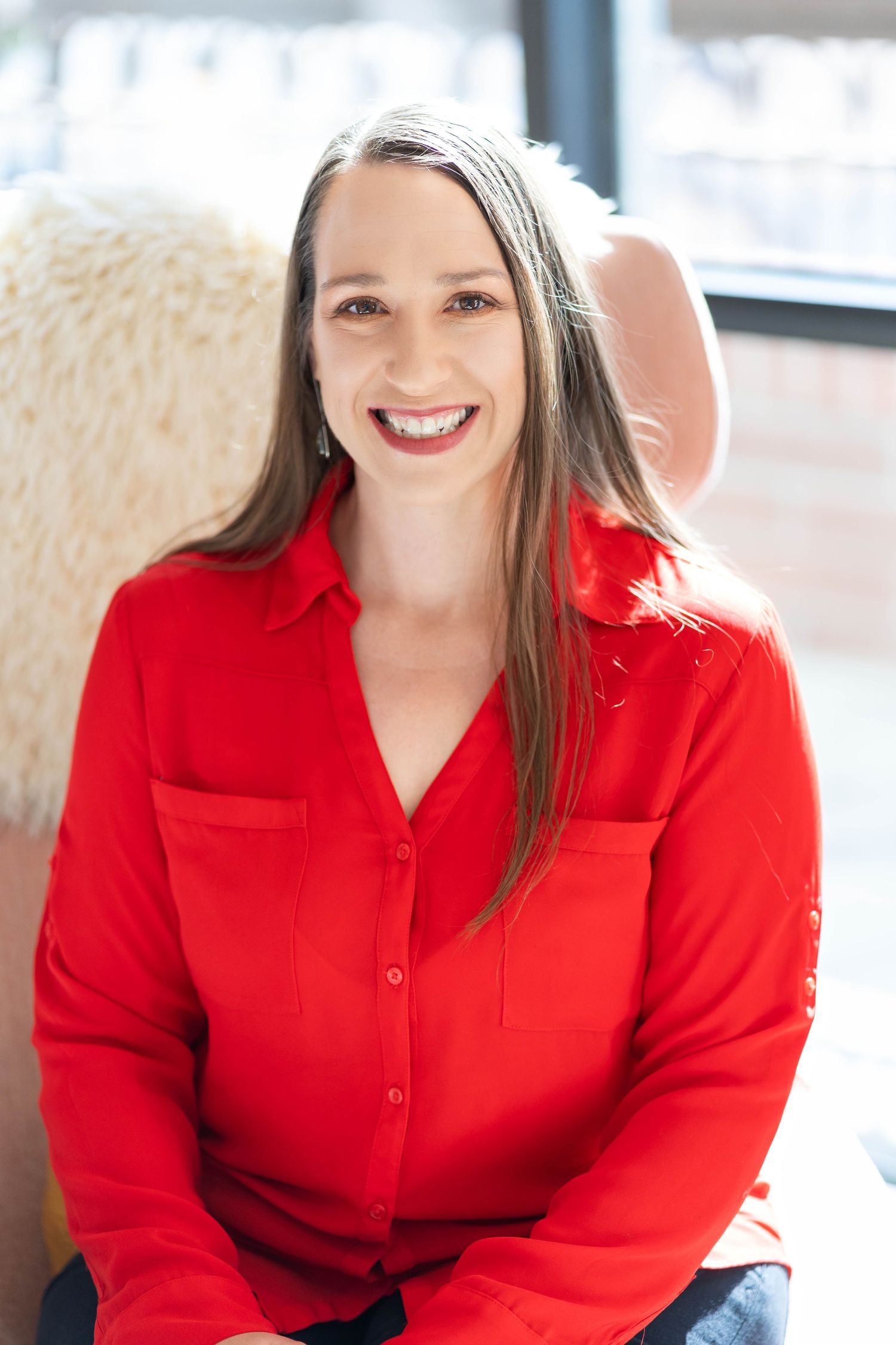 woman wearing a red blouse