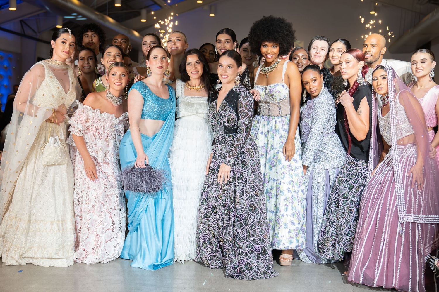 women of many ethnicities in nice colorful dresses