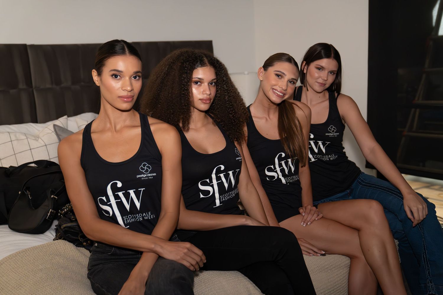 scottsdale fashion week models wearing black tank tops getting ready for runway