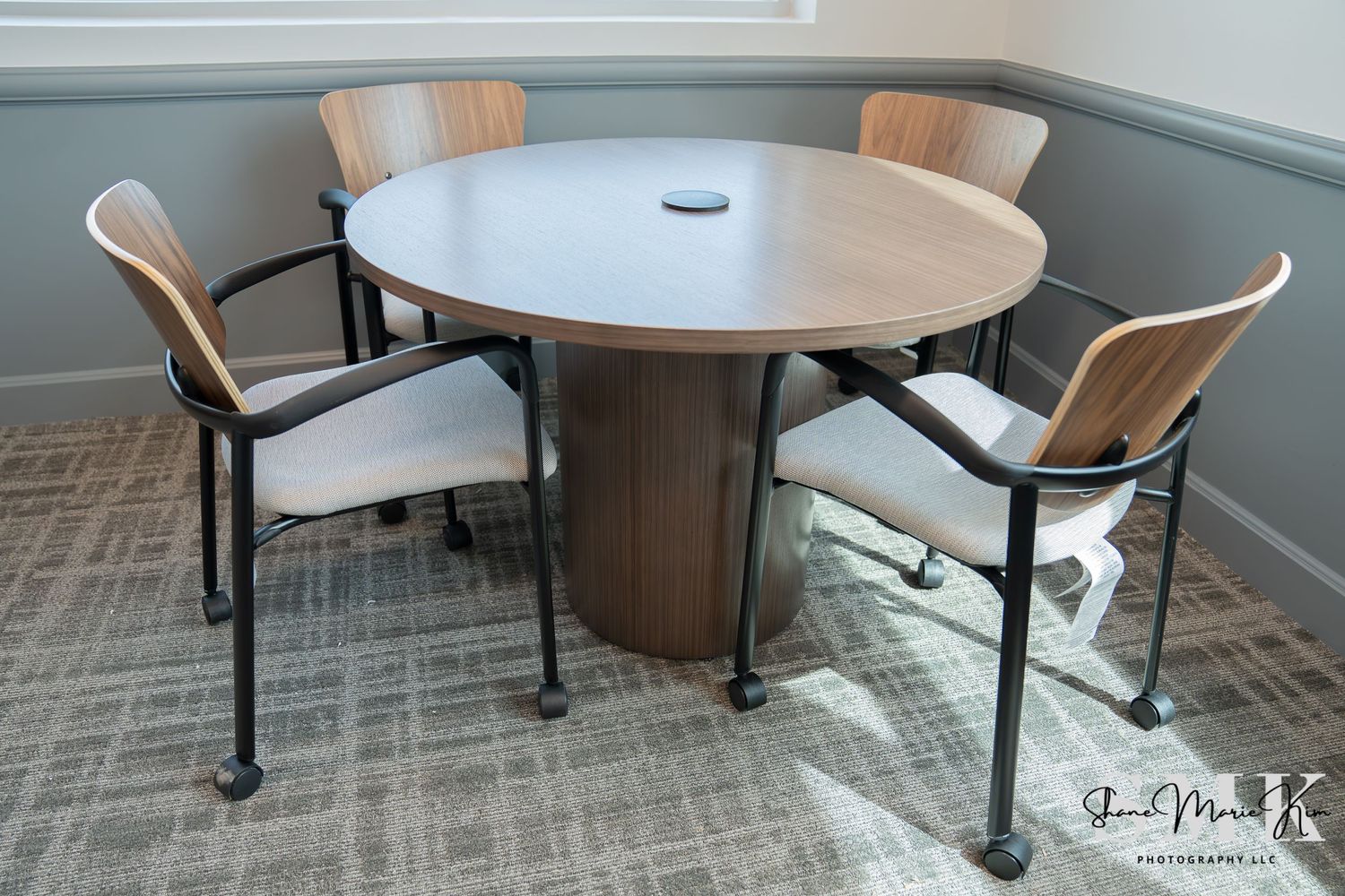 circular brown table with 4 chairs