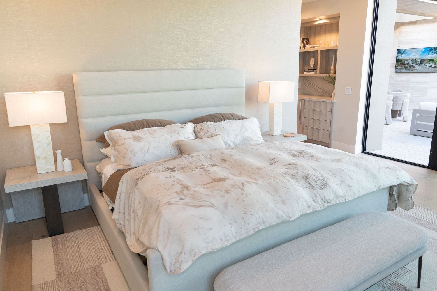 guest room with queen sized bed and access to the backyard
