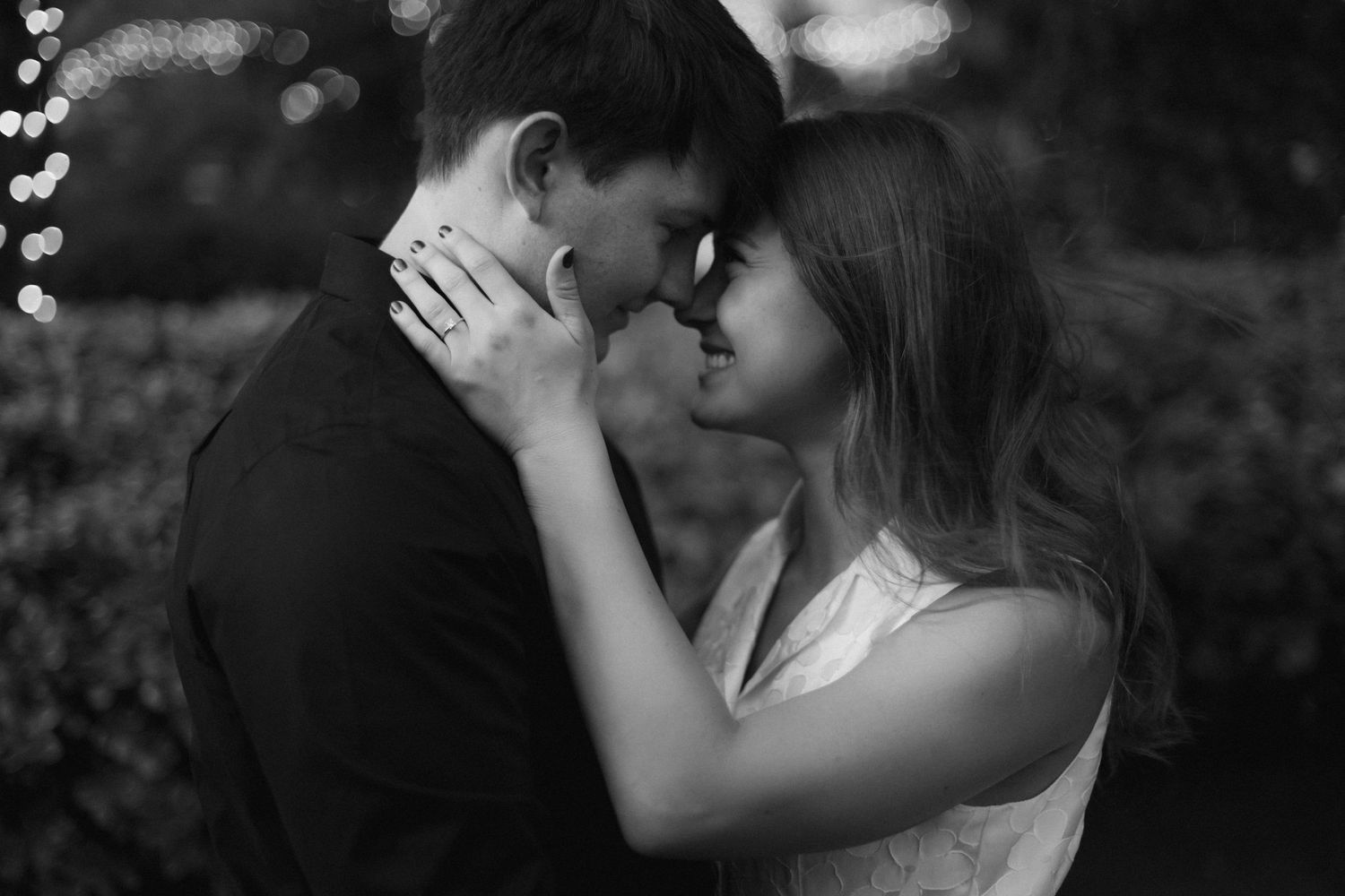 Intimate black and white portraits capturing couple's romantic moments.