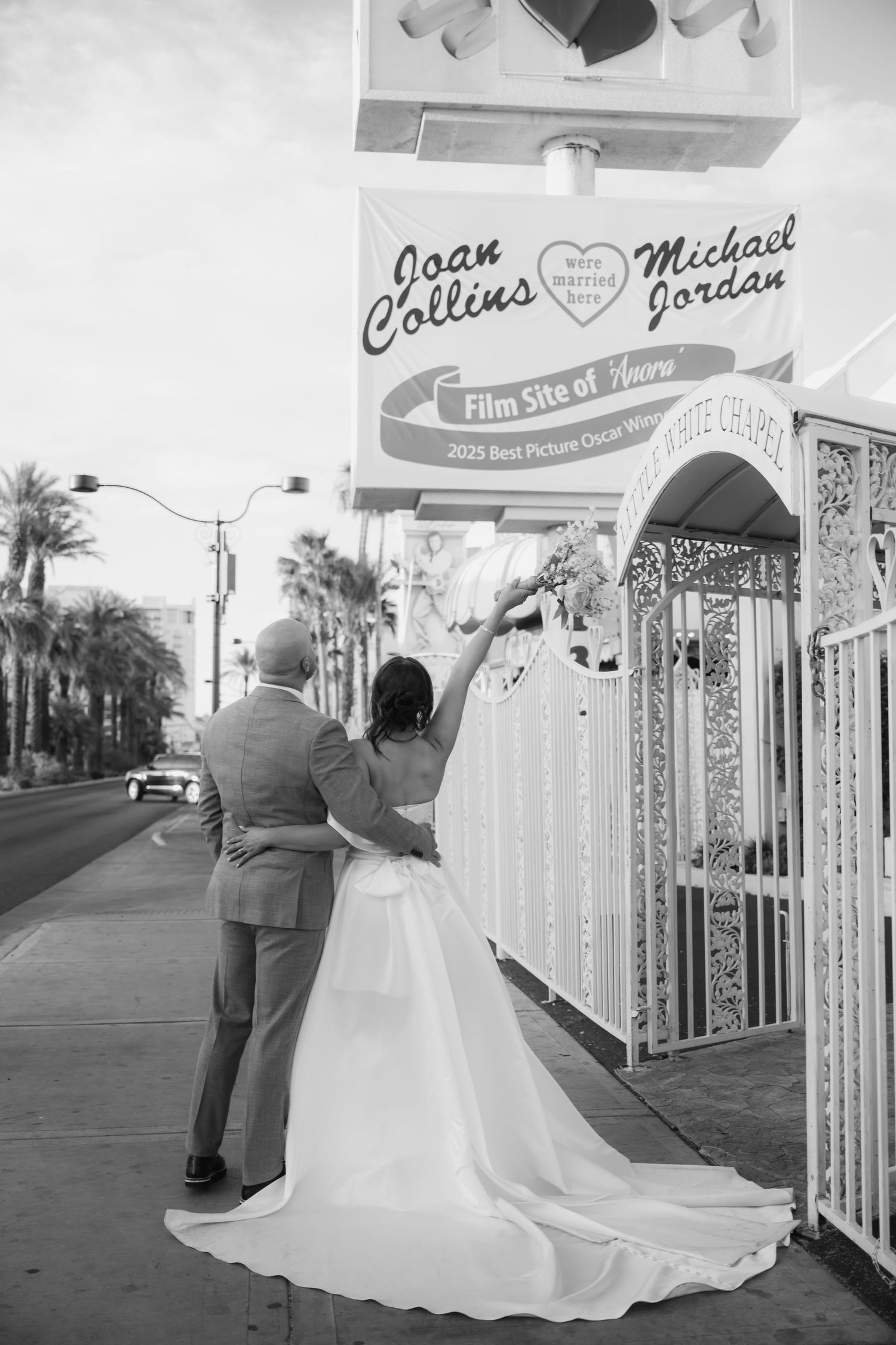 Black and white wedding photos taken outside a vintage Las Vegas chapel.