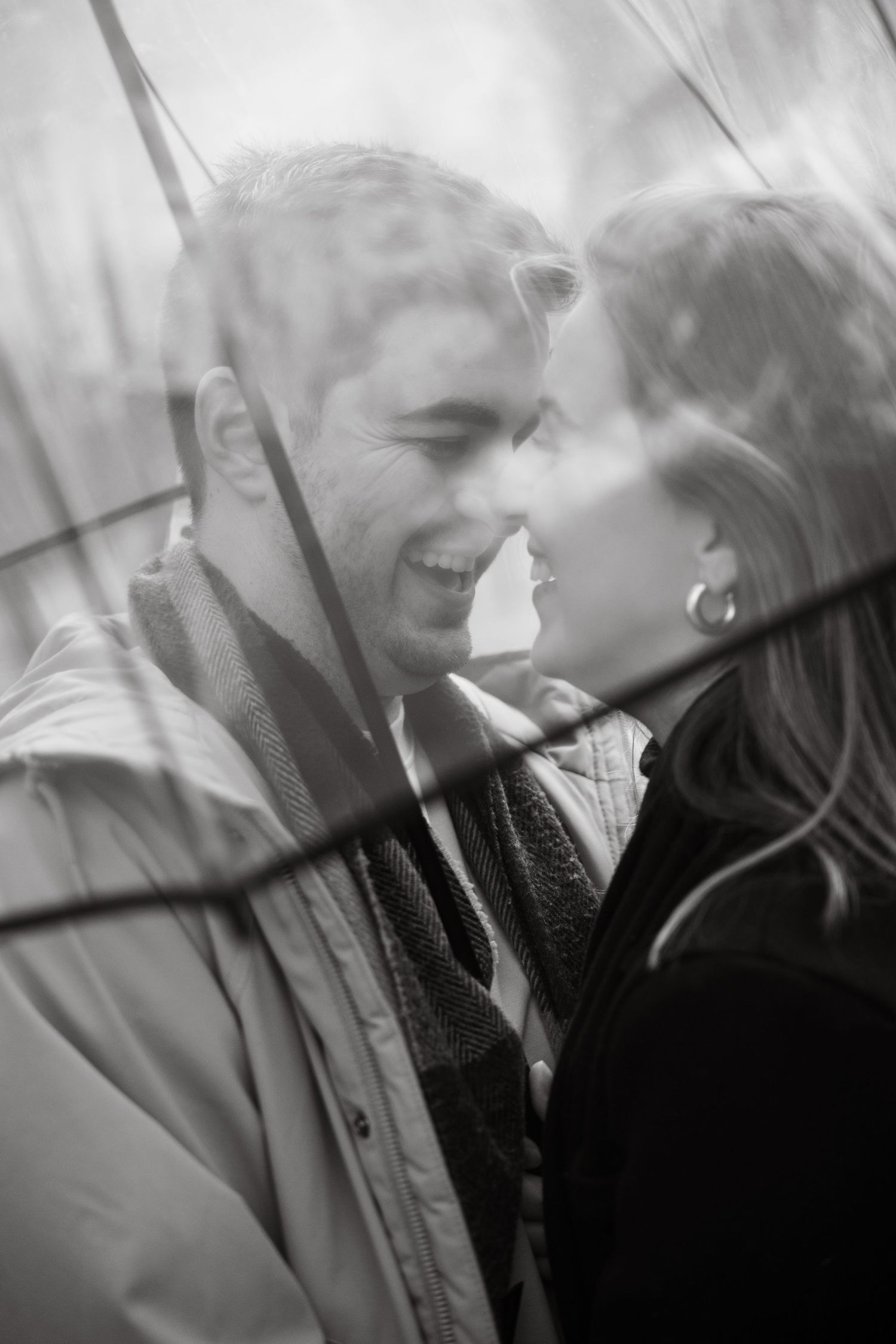 A series of black and white romantic photographs showing a couple in intimate close-up moments.