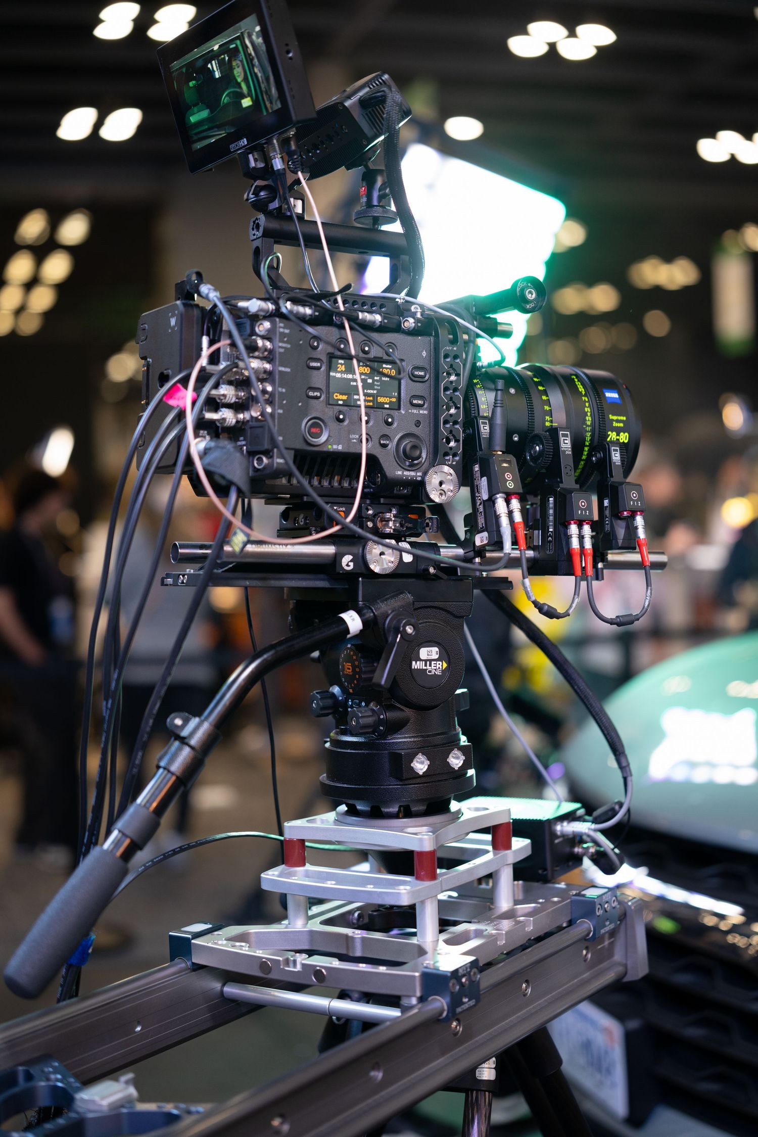 Professional video camera mounted on specialized rigging system.