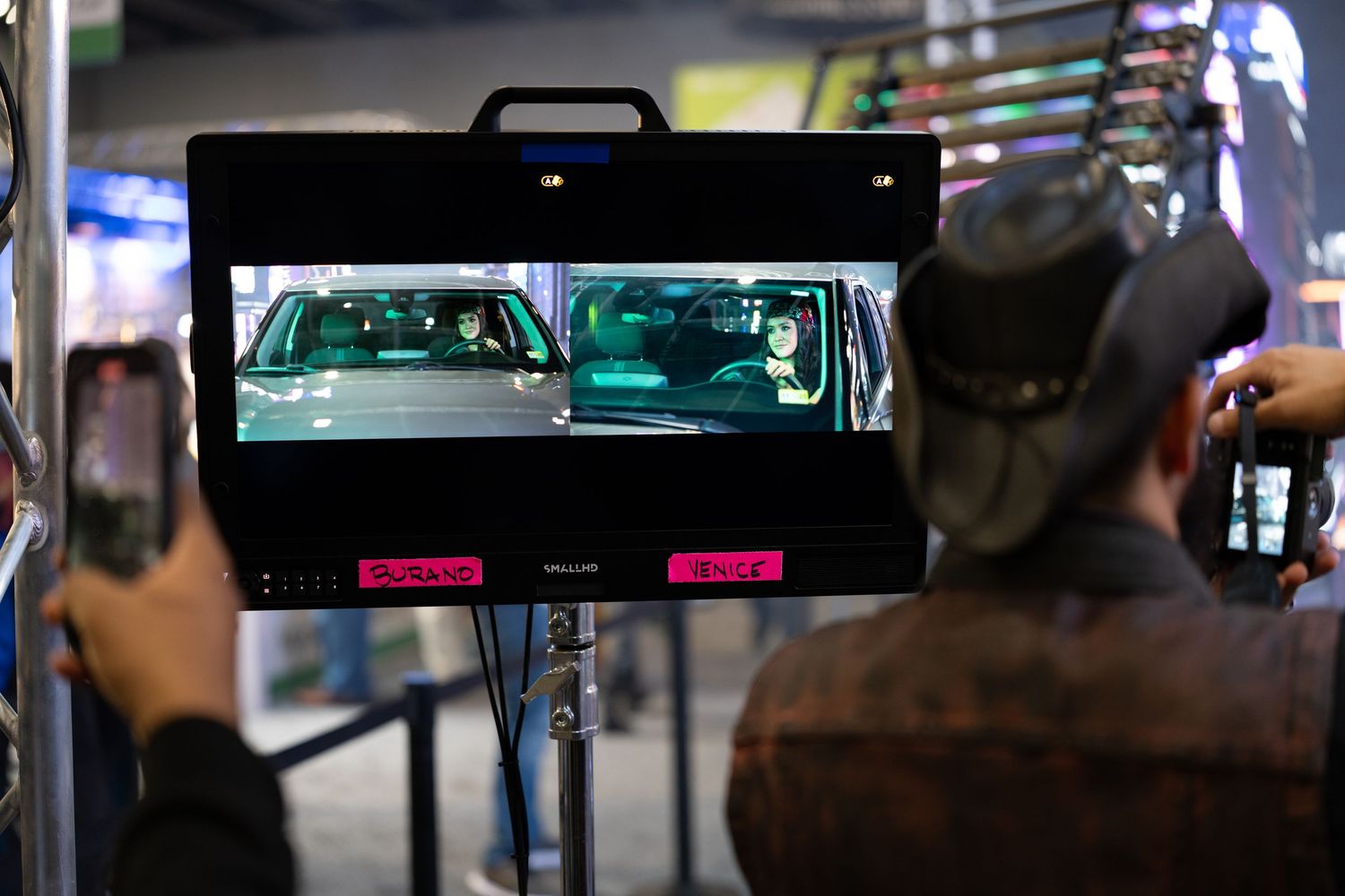 Professional video production setup with multiple display screens.