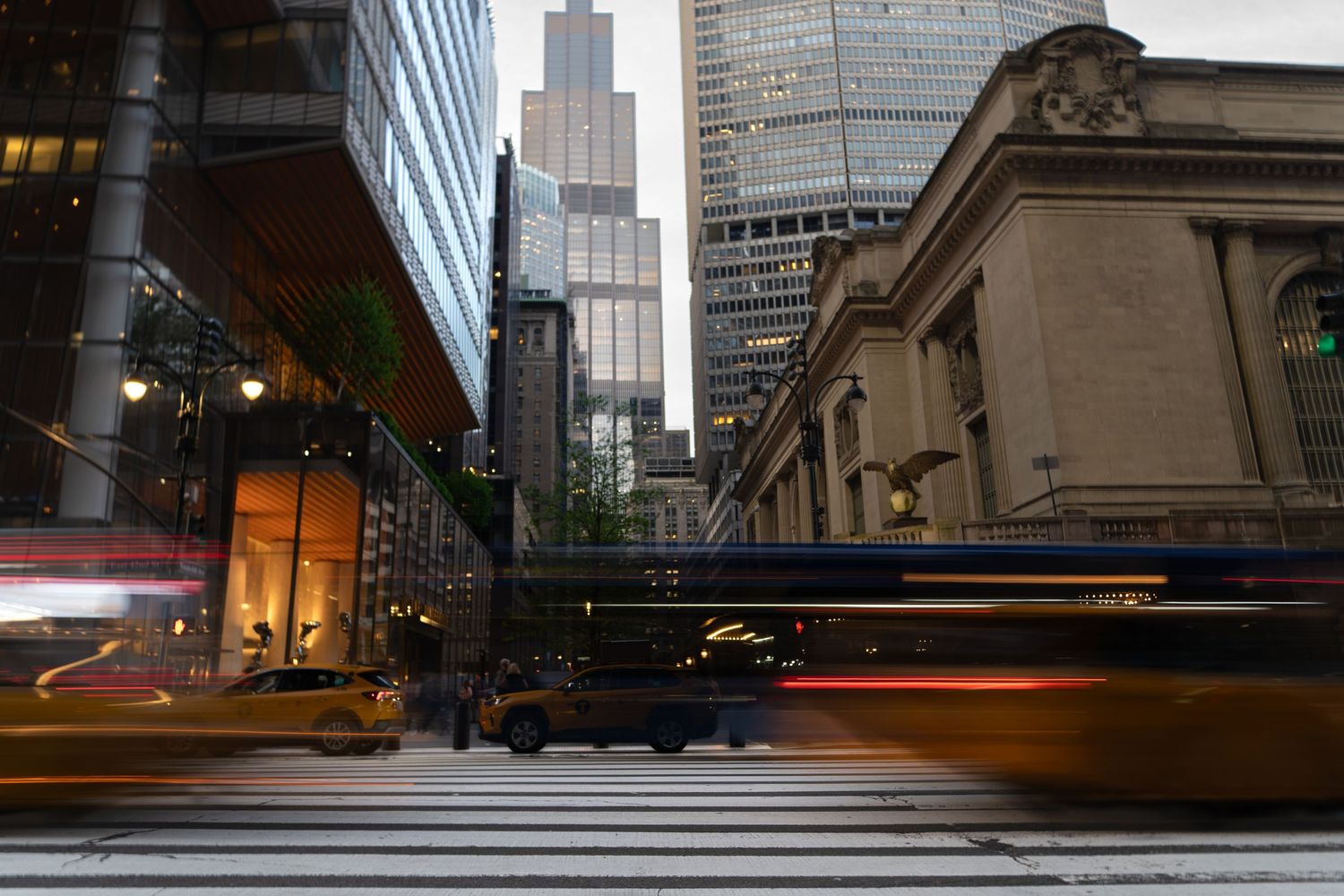 Urban cityscape with modern buildings and architectural details at dusk.