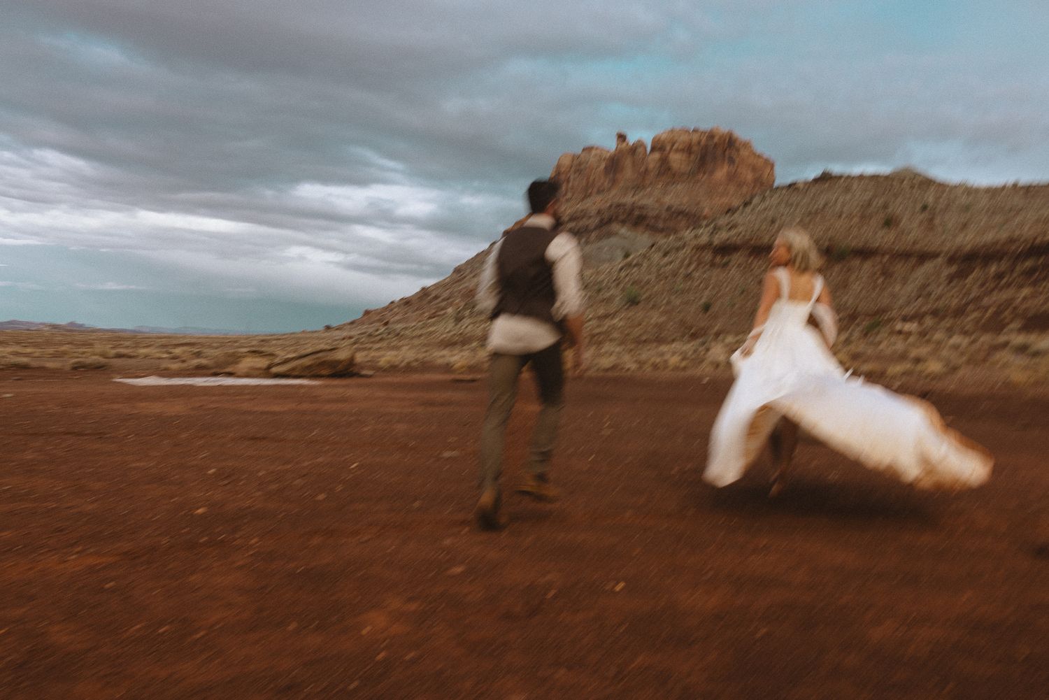 Adventurous couple at The Red Earth Venue in Moab, Utah, by Sammy Aucella Photography