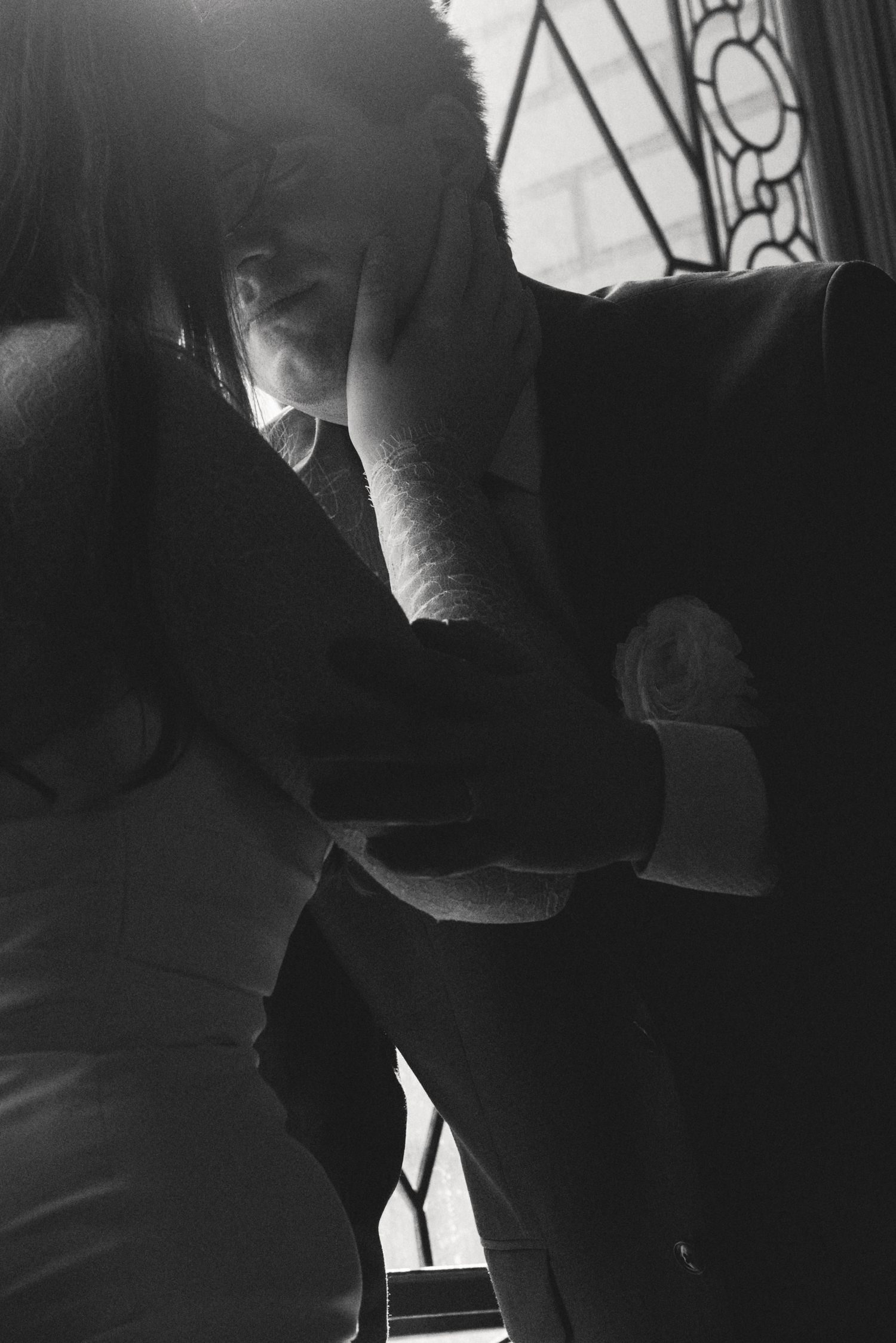 Black and white couple detail at a San Francisco City Hall elopement, by Sammy Aucella Photography