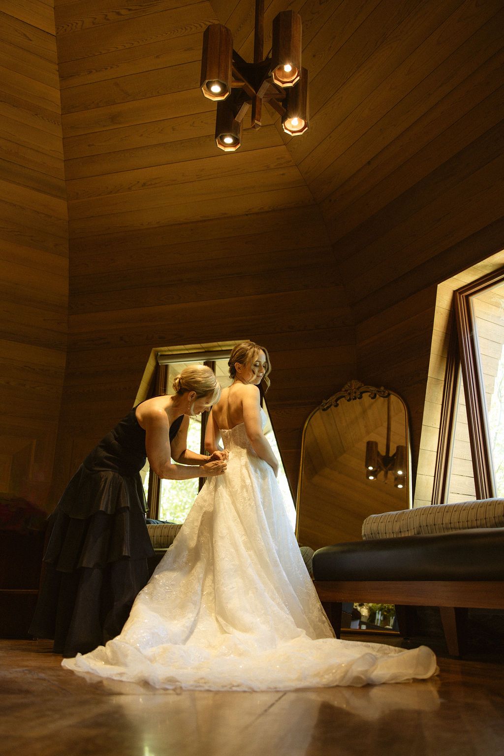 Bride reflected in the bridal suite mirror at Nakoma Resort in Clio, California, by Sammy Aucella Photography