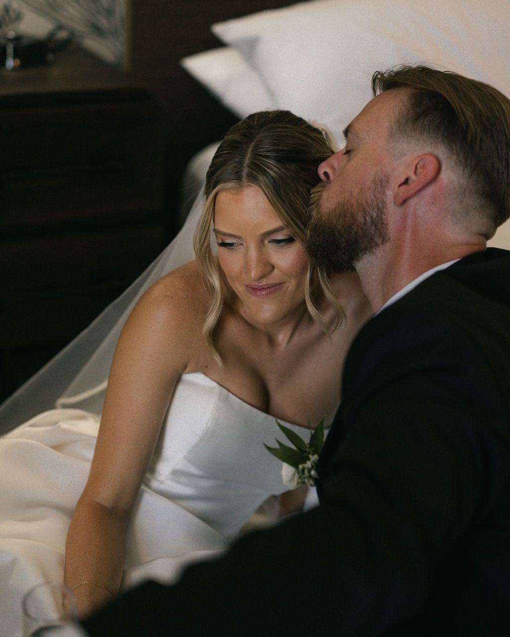 Groom kissing the bride's forehead at a Whitney Peak Hotel wedding in Reno, Nevada, by Sammy Aucella Photography