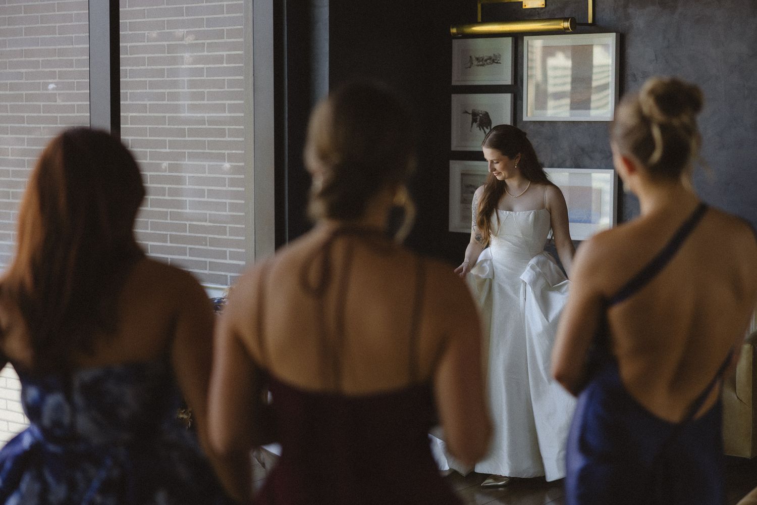 Bride embracing her bridesmaids in a getting-ready moment at a New York wedding, by Sammy Aucella Photography