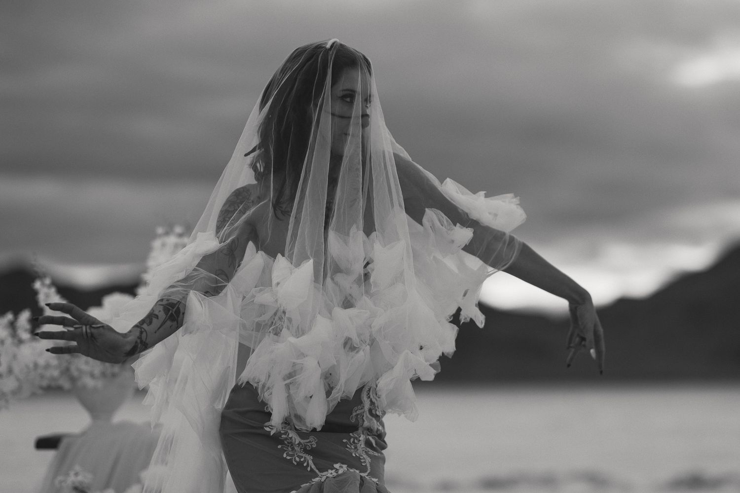 Cinematic art elopement at the Bonneville Salt Flats in Salt Lake City, UT. Artistic Direction and photography by Sammy Aucella Photography.