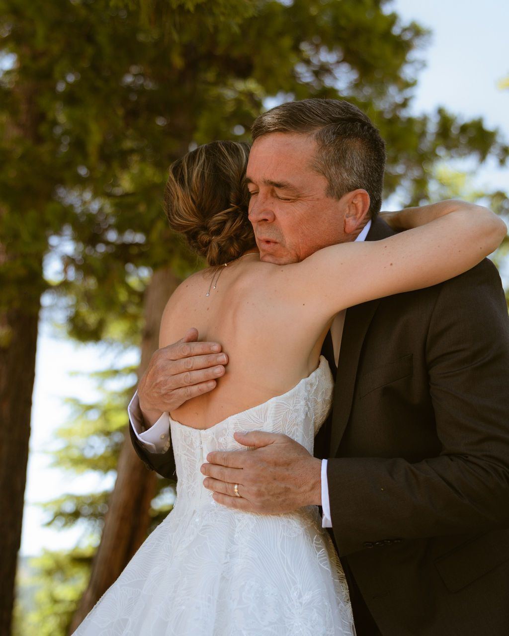 Emotional first look between a father and the bride at Nakoma Resort in Clio, California, by Sammy Aucella Photography