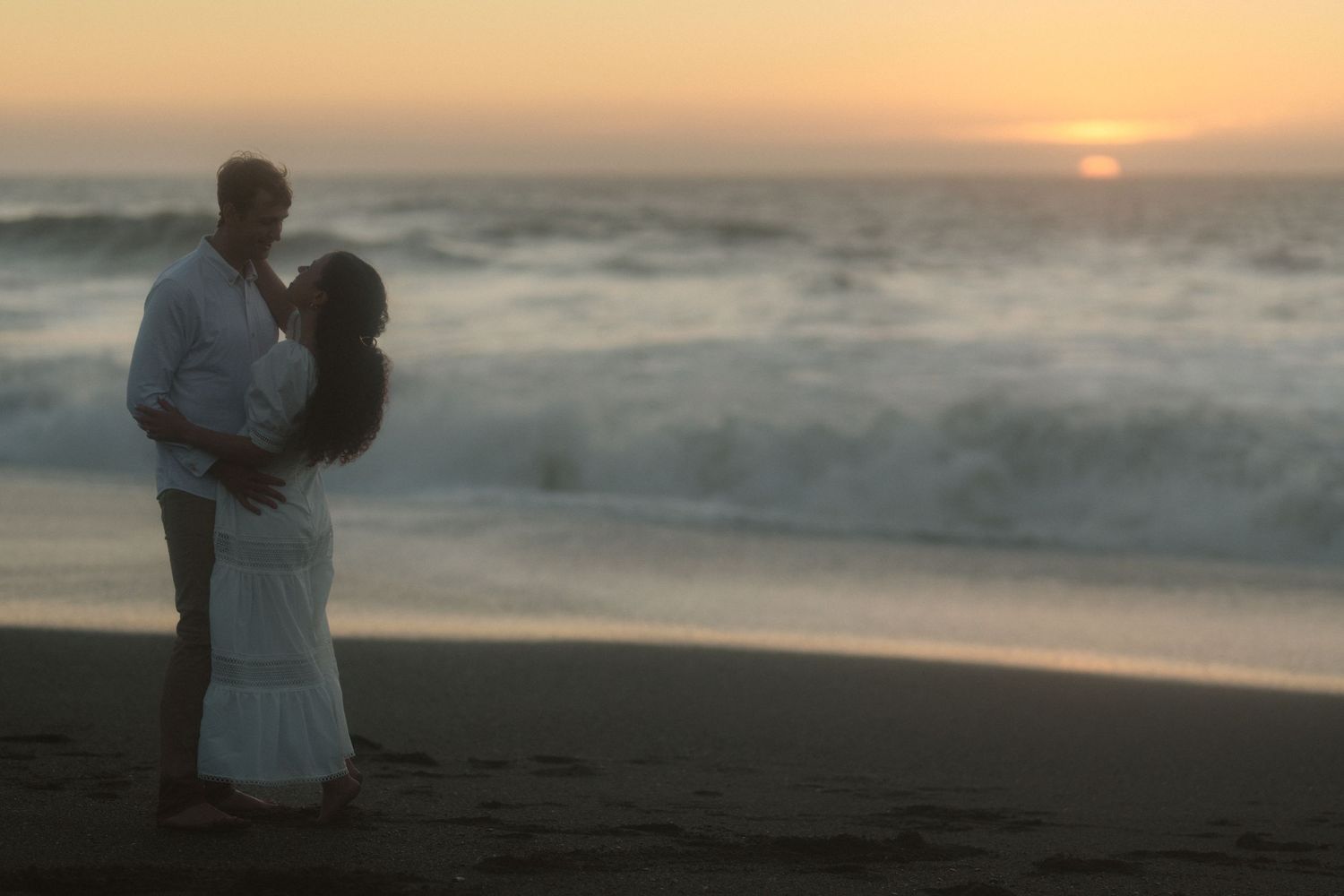 Close-up portrait of couple during intimate engagement photography in Gualala California Mendocino CA by Sammy Aucella Photography