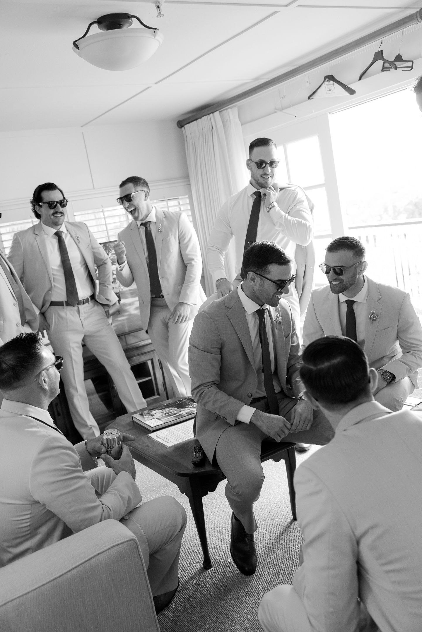 Groomsmen getting ready at a Mission Ranch luxury wedding in Carmel, California, by Sammy Aucella Photography