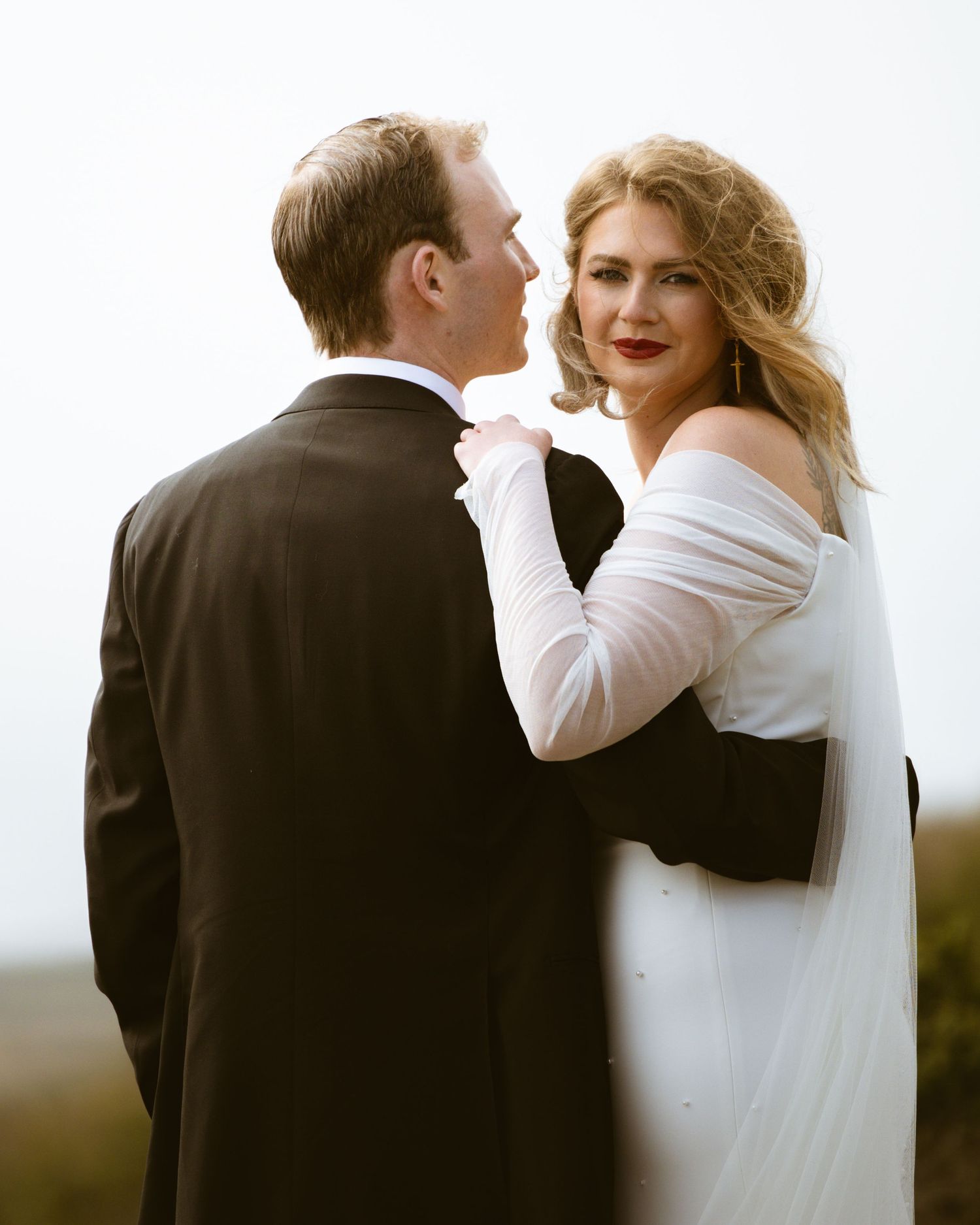 Couple dancing close at a Cuffey's Cove wedding in Elk, Mendocino, California, by Sammy Aucella Photography