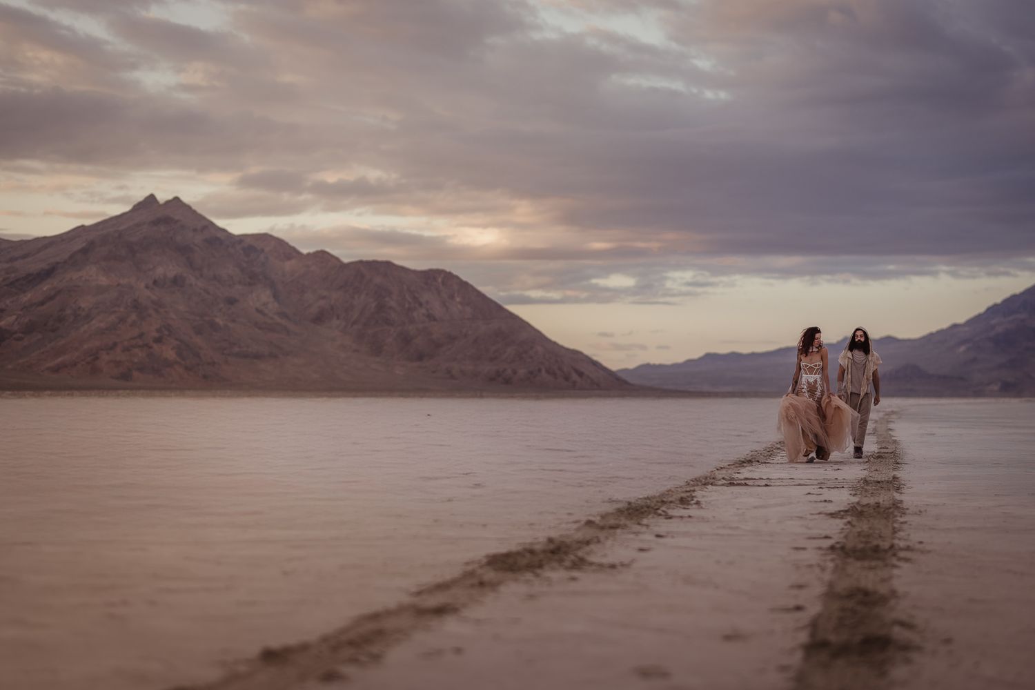 Cinematic art elopement at the Bonneville Salt Flats in Salt Lake City, UT. Artistic Direction and photography by Sammy Aucella Photography.