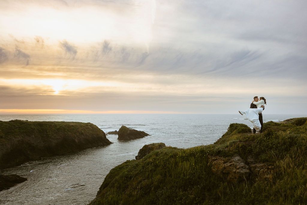Couple on the Mendocino cliffs at a romantic coastal sunset wedding, by Sammy Aucella Photography