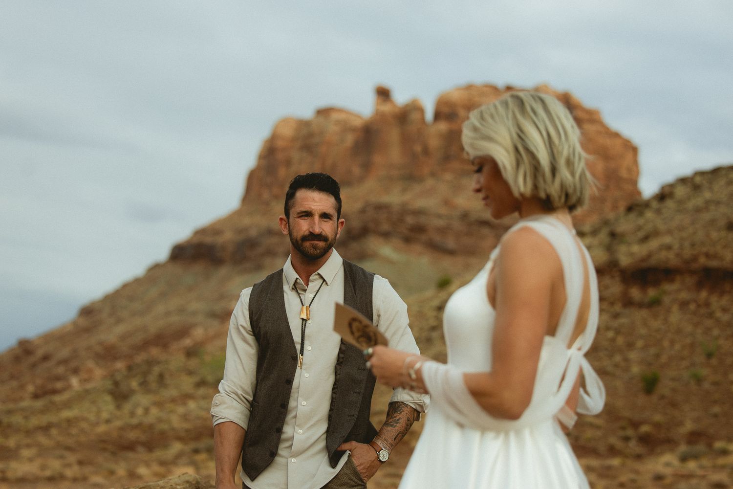 Adventurous couple at The Red Earth Venue in Moab, Utah, by Sammy Aucella Photography