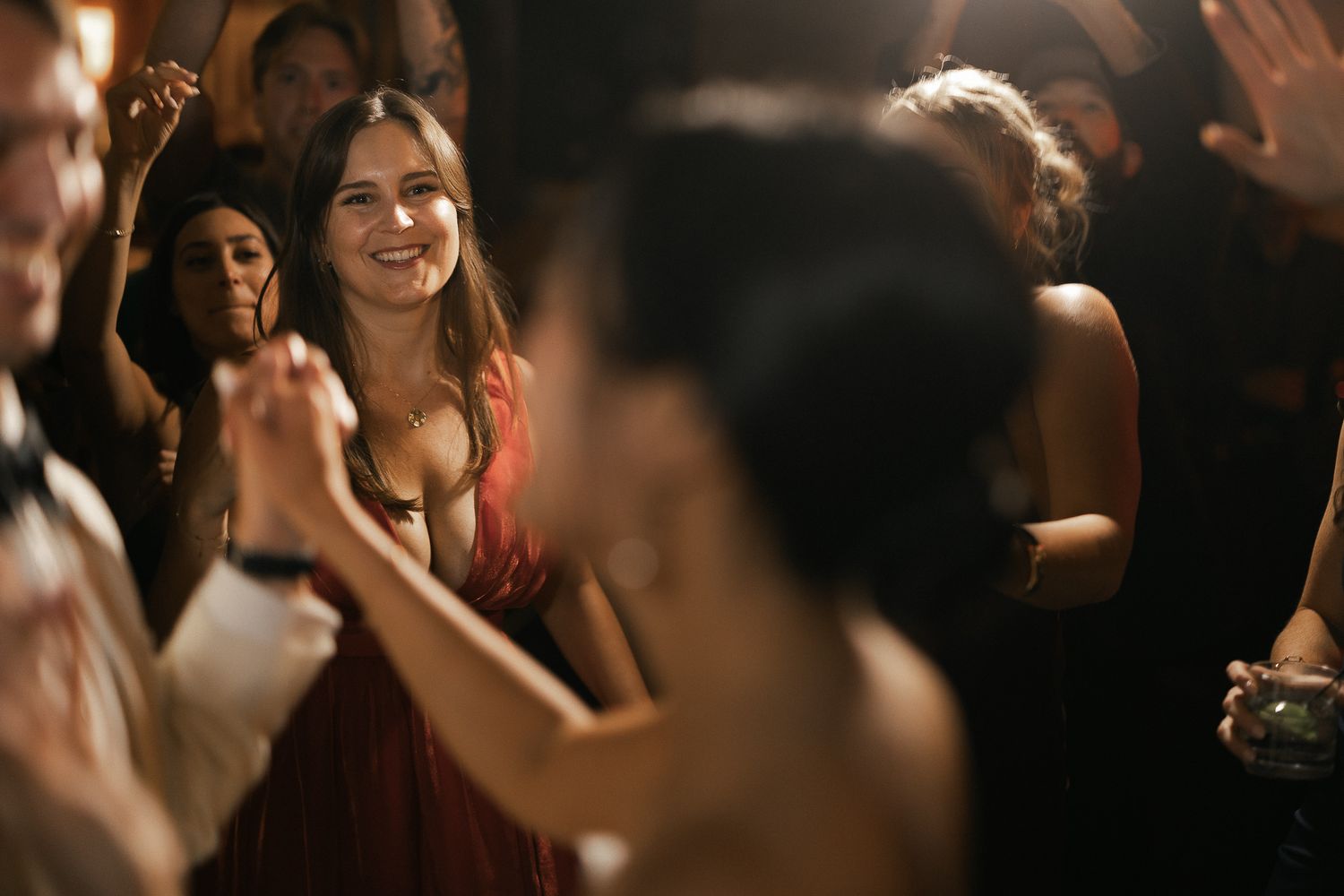 Best friend watching the bride dance at a Glenbrook wedding on Lake Tahoe, by Sammy Aucella Photography