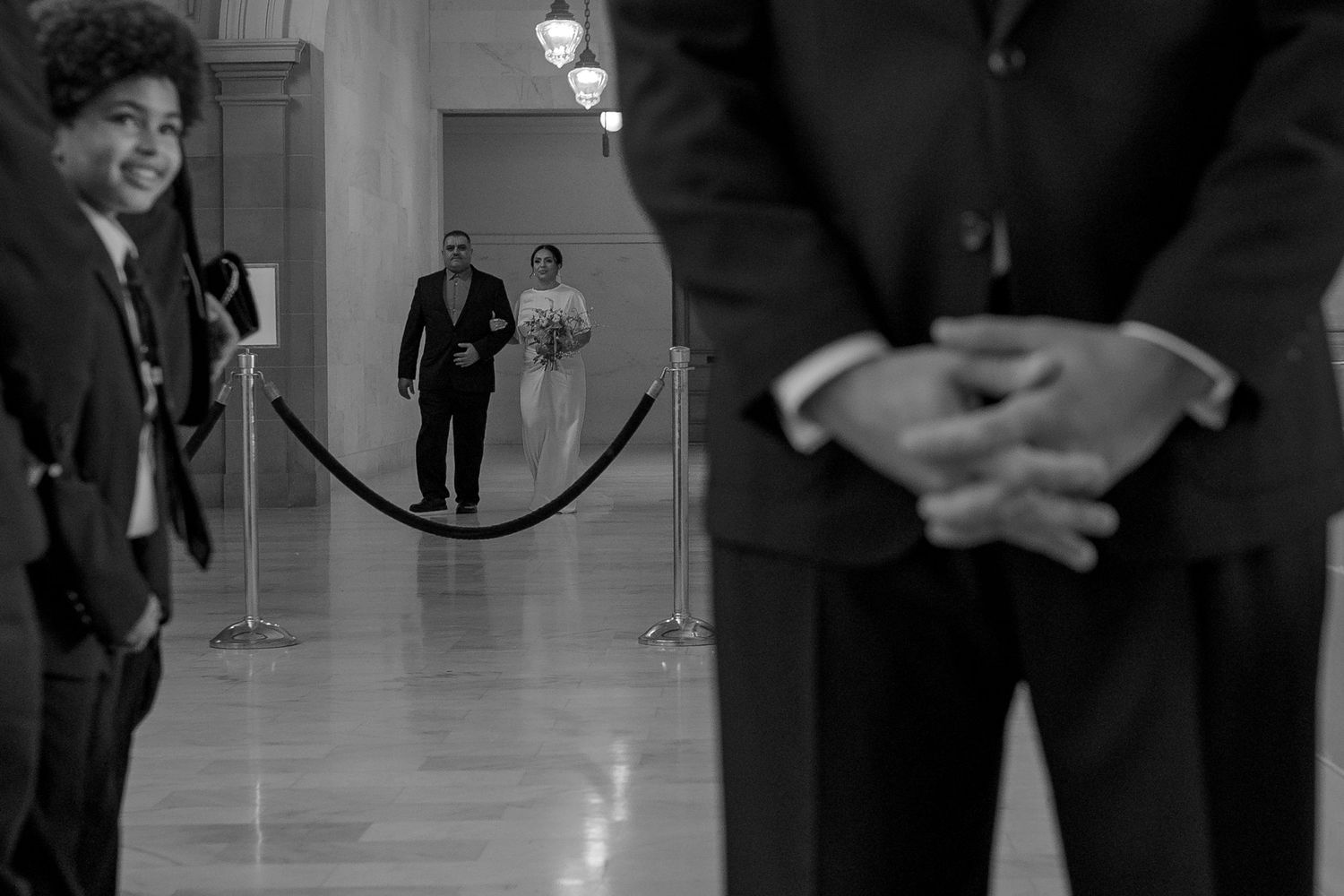 Black and white processional at a San Francisco City Hall elopement, by Sammy Aucella Photography