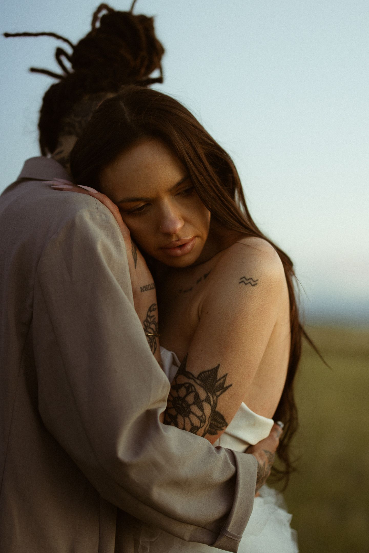 Emotional portrait of the couple at golden hour, by Sammy Aucella Photography