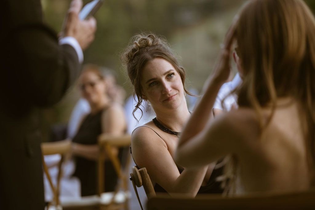 Maid of honor in tears during the speeches at a Ritz-Carlton Lake Tahoe wedding, by Sammy Aucella Photography