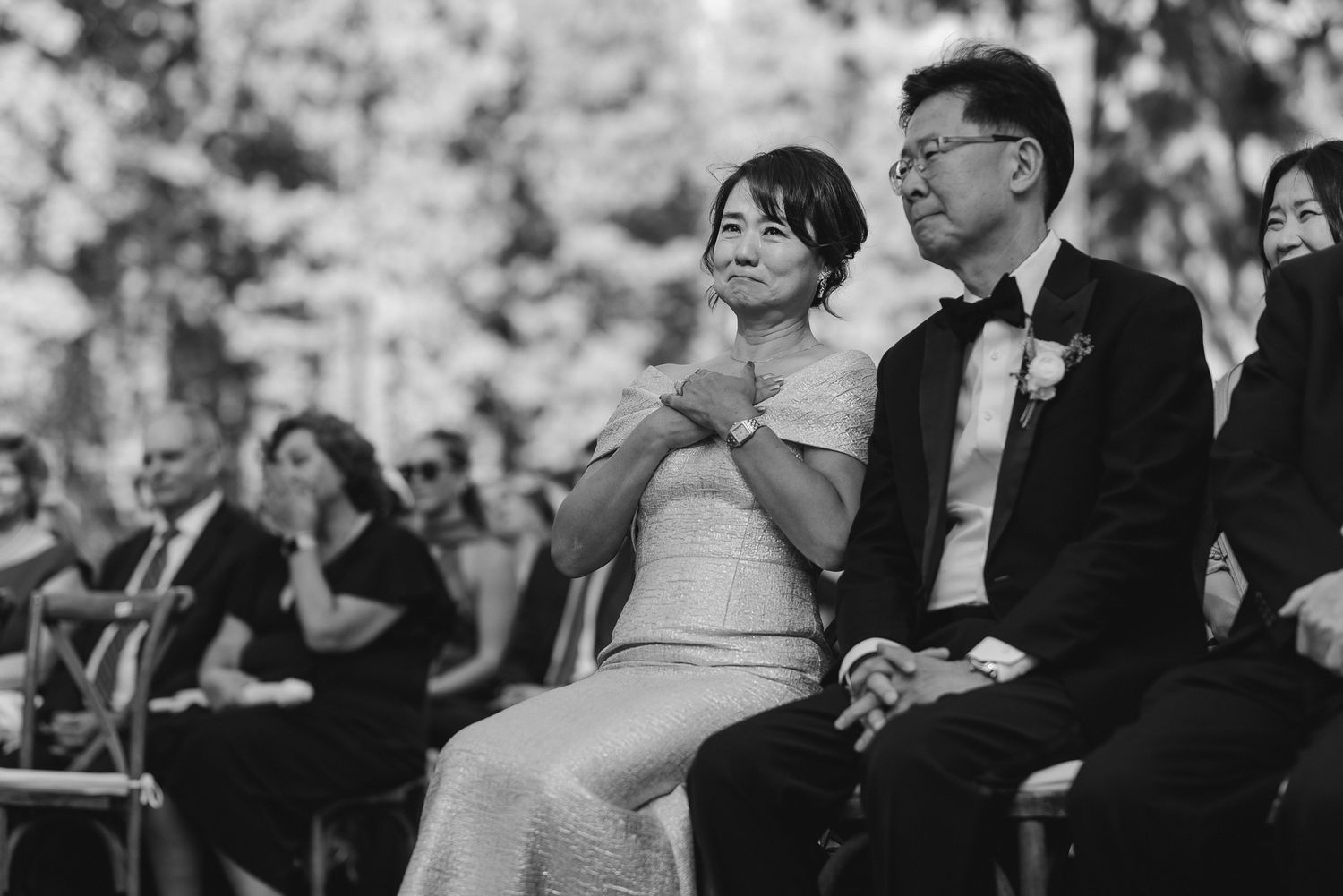 Black and white of the mother in tears during a Glenbrook ceremony on Lake Tahoe, by Sammy Aucella Photography