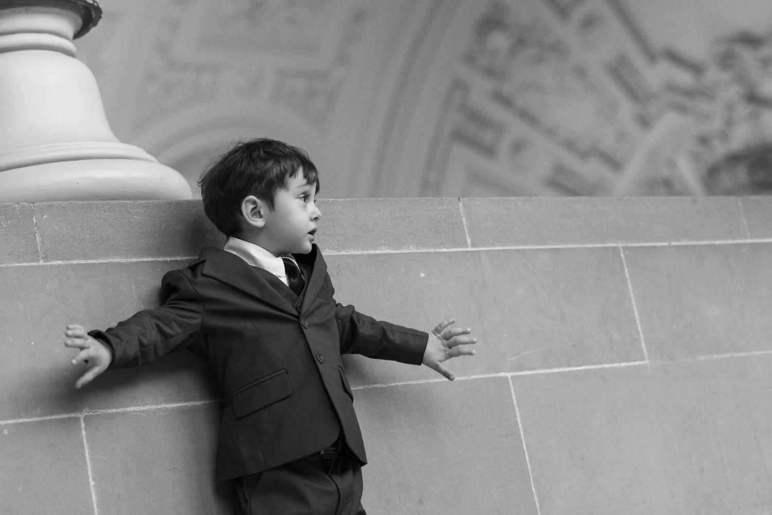 Ring bearer in a suit at a San Francisco City Hall elopement, by Sammy Aucella Photography