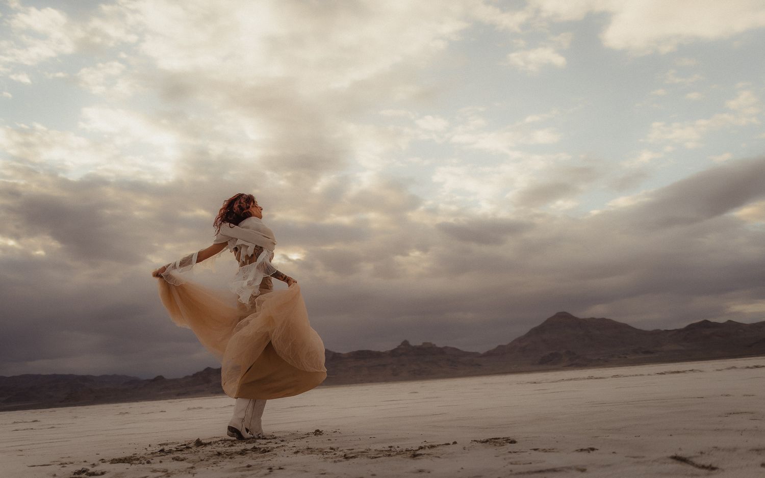 Cinematic art elopement at the Bonneville Salt Flats in Salt Lake City, UT. Artistic Direction and photography by Sammy Aucella Photography.