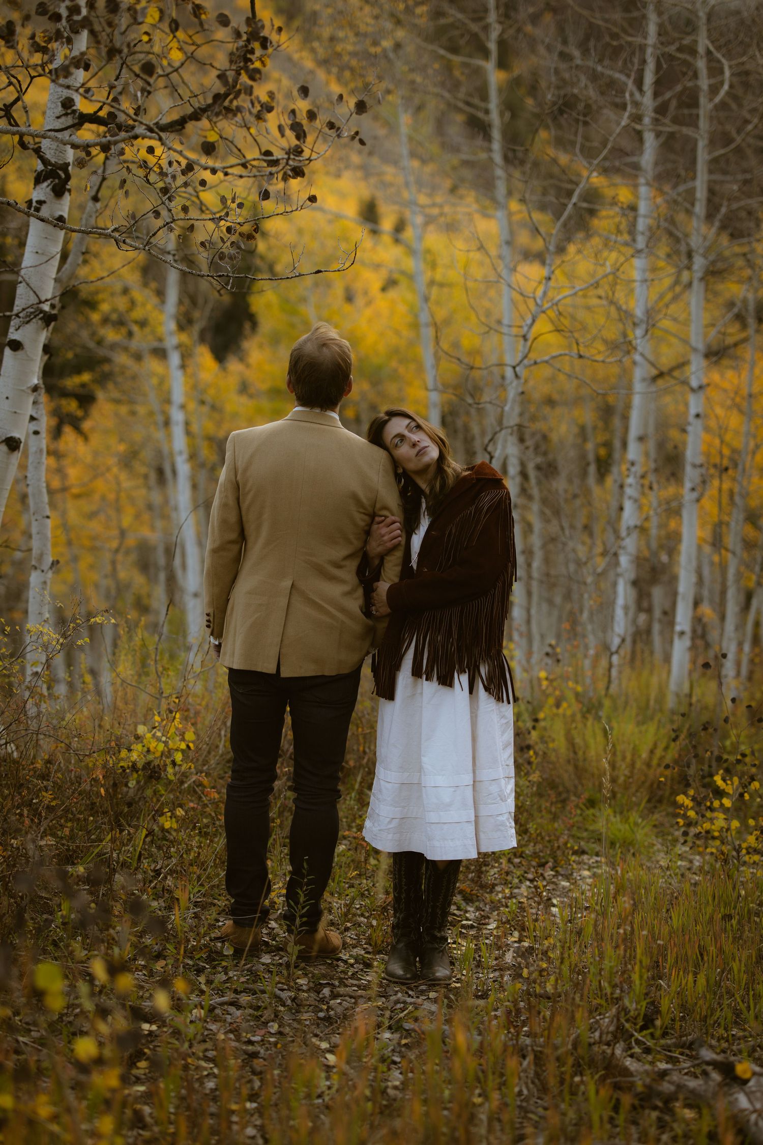 Wes Anderson Style engagement shoot in Aspen CO by Sammy Aucella Photography. Western Couple in Fall foliage.
